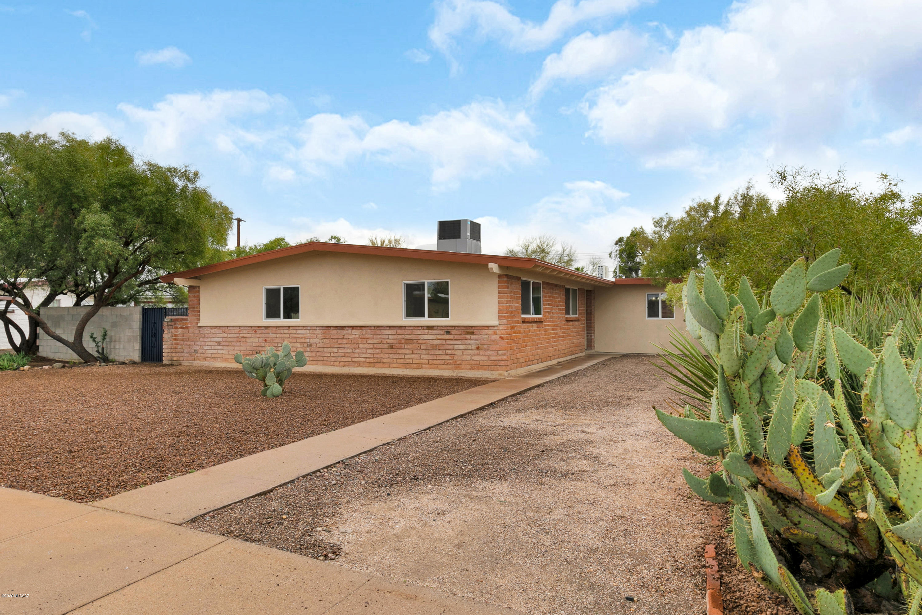 Beautifully Upgraded Eastside Home with So Many Extras! 1800 Sq Ft, 4 Bedrooms/3 Bathrooms with 2 Master Suites! Spacious Split Bedroom Floor Plan. Gorgeous Kitchen with New Granite Countertops, White Shaker Cabinetry, New Stainless Steel Appliances and Beautiful Pendant Lighting. Large Dining Area and Living Room Perfect for Entertaining. Ceiling Fans Throughout. Gorgeous Black and White Tile Flooring. New Carpet in Bedrooms. Three Beautiful Bathrooms with New Vanities, Fixtures and Custom Tiled Showers. New AC, Water Heater and 200 Amp Electrical Panel. Generously Sized Laundry Room. Large Private Lot. Fresh Gravel in Front Yard. Beautiful Curb Appeal. Convenient Eastside Location. This Home is Amazing and Won't Last Long! Go Show Today!