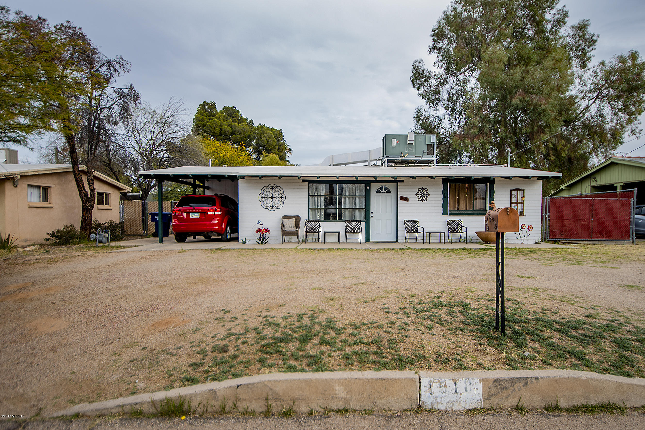 Classic 1950's on the outside with plenty of updates in the inside, from exposed beams to farm house kitchen, you'll love additions to the home. This 3 bed 2 bath home has a huge back yard, built in storage unit and room enough to park an RV. Great central location for easy commute to the university or downtown. In the 85712 zip code making it Pathway to Purchase eligible. Don't wait make an appointment to view this home today!
