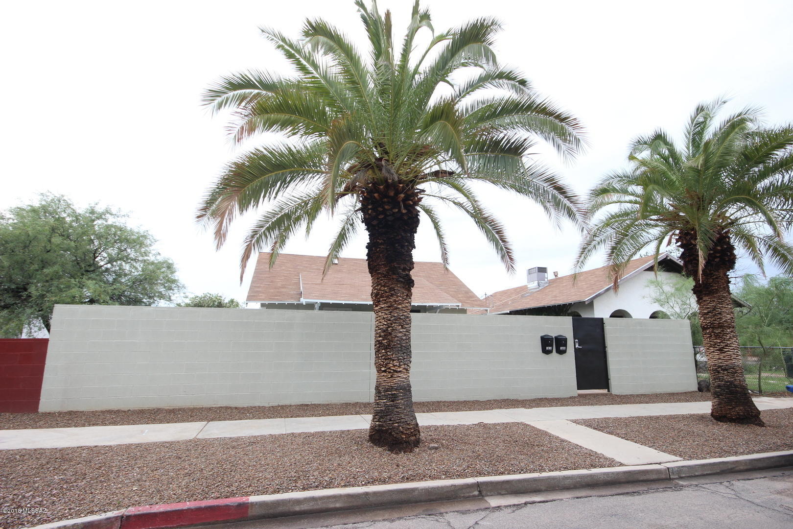 Large 10 bedroom Duplex located 2 streets south of University of Arizona! Fully leased through July 2018! Rents for $7,500 per month. 7.29% Cap Rate. Property was remodeled in 2007 with new AC, roof, paint, finishes.  New Kitchen in 2013. New Flooring in 2012. Back unit had new addition and complete remodel in 2008. Highly desirable rental property close to UofA. One of the members is a licensed real estate Broker in AZ.
