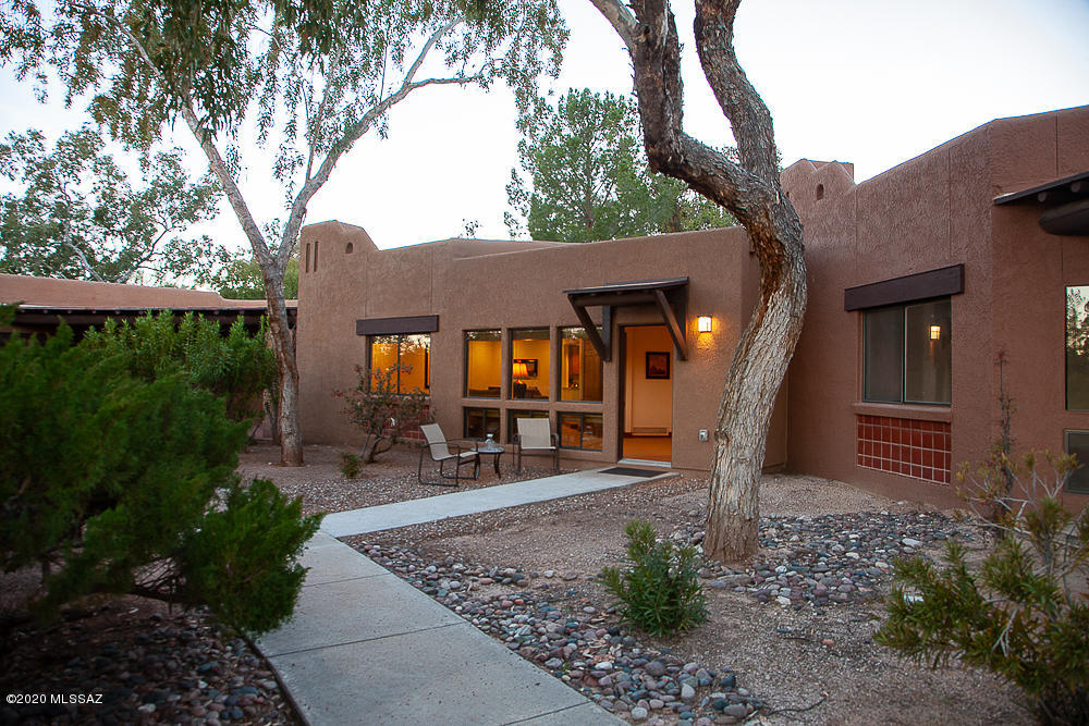 Enjoy the serenity of this 3 BR & 3 BT 1888 sq. ft. one of the largest casitas on the grounds. Located around the Iconic Peace Park on the pristine grounds of the World-renowned Canyon Ranch Wellness Resort. The front patio and the expanded living room boasts panoramic views of the Catalina and Rincon mountains. Enjoy the Sunrise and Sunset while relaxing on your private patio or inviting the mountain views into the living room. Beautiful kitchen flowing into the living and dining area. Recent additions of bedrooms and bathrooms gives it a new construction touch. All rooms are laid out for total privacy making this casita ideal for accommodating family and guests' gatherings. A private parking spot right at your backyard for your convenience. Follow a healthy lifestyle year-round. Enjoy the luxurious amenities at your fingertips. State of the art Spa, gyms, swimming and Aquatic pools and body works. Access to medical and wellness programs offered by dedicated professionals. Dine at the two venues offering healthy gourmet dishes. All furnishings included and conveys with property.