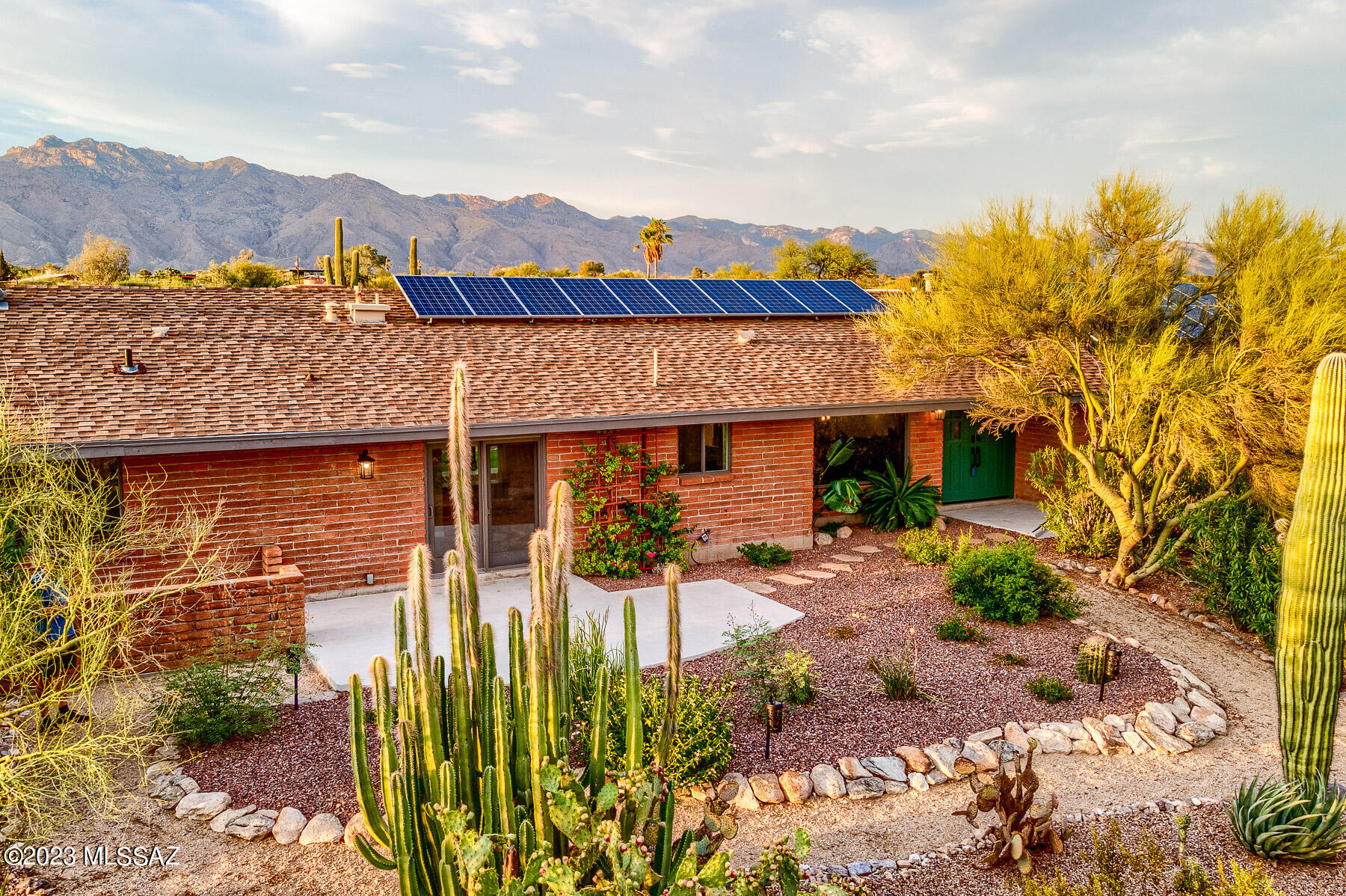 Turnkey Foothills Gem Classic Catalina Foothills home remastered to combine modern conveniences while retaining the charm of the original architecture. Sitting on nearly an acre on a no outlet street, privacy and nature surround you with charming trails and mountain views. The interior includes exposed brick and new travertine floors. All bathrooms have been completely updated with designer tile, vanities, lighting and frameless glass shower enclosures.  The kitchen combines elegant dual color cabinetry, complimentary quartz and granite countertops, stainless appliances, with an efficient function any cook would appreciate. No detail was spared in making this home convenient, including smart-home features throughout the house. There are multiple outdoor entertaining areas. exceptional views. Centrally located. Seller is a licensed real estate agent.

New mechanical systems (3.5 ton and a 2 ton - 8/23), new roof (8/23), 2 new water heaters (8/23), new washer, dryer, dishwasher, microwave and refrigerator (4/23), all of which come with transferable warranties.

NOTE! - Solar panels removed from roof after 7/23 storm. Pictures will be updated shortly. Apologies for any confusion.