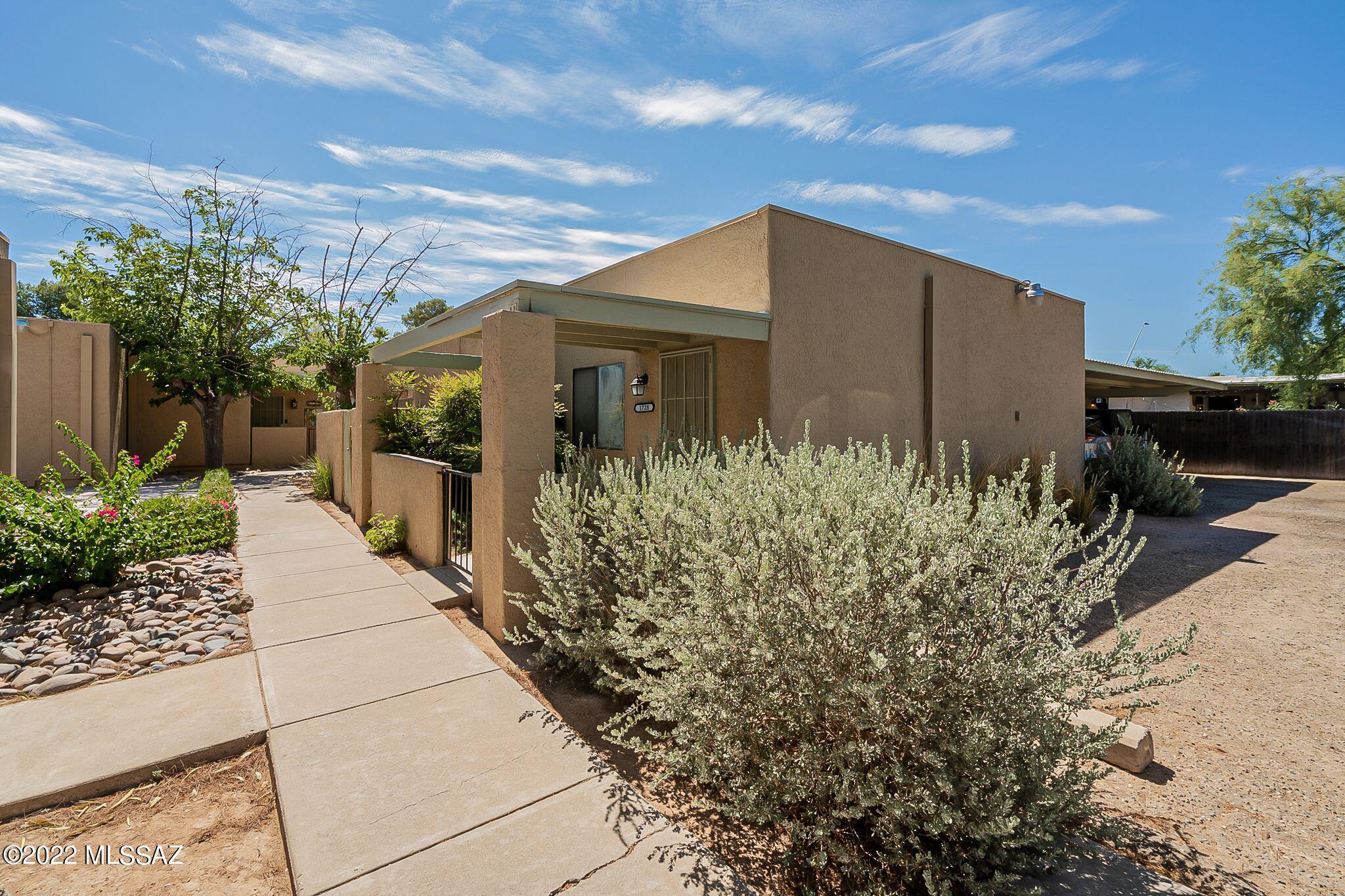 This is not your typical condo! This property shares no walls with any neighbors, and is  the only unit with beautiful, exposed wood ceilings in the living room. 

You will enjoy the large living room with vaulted ceilings. Spend your evenings in your own private back patio or have coffee in the enclosed front porch area. 

Located conveniently in central Tucson, you will be just miles from all the retail, restaurants, and grocery stores you could ask for!

This home also has many recent updates, such as a 2-year-old AC unit, dual flush toilets, and newer water heater.

Come see this amazing place before it's gone!