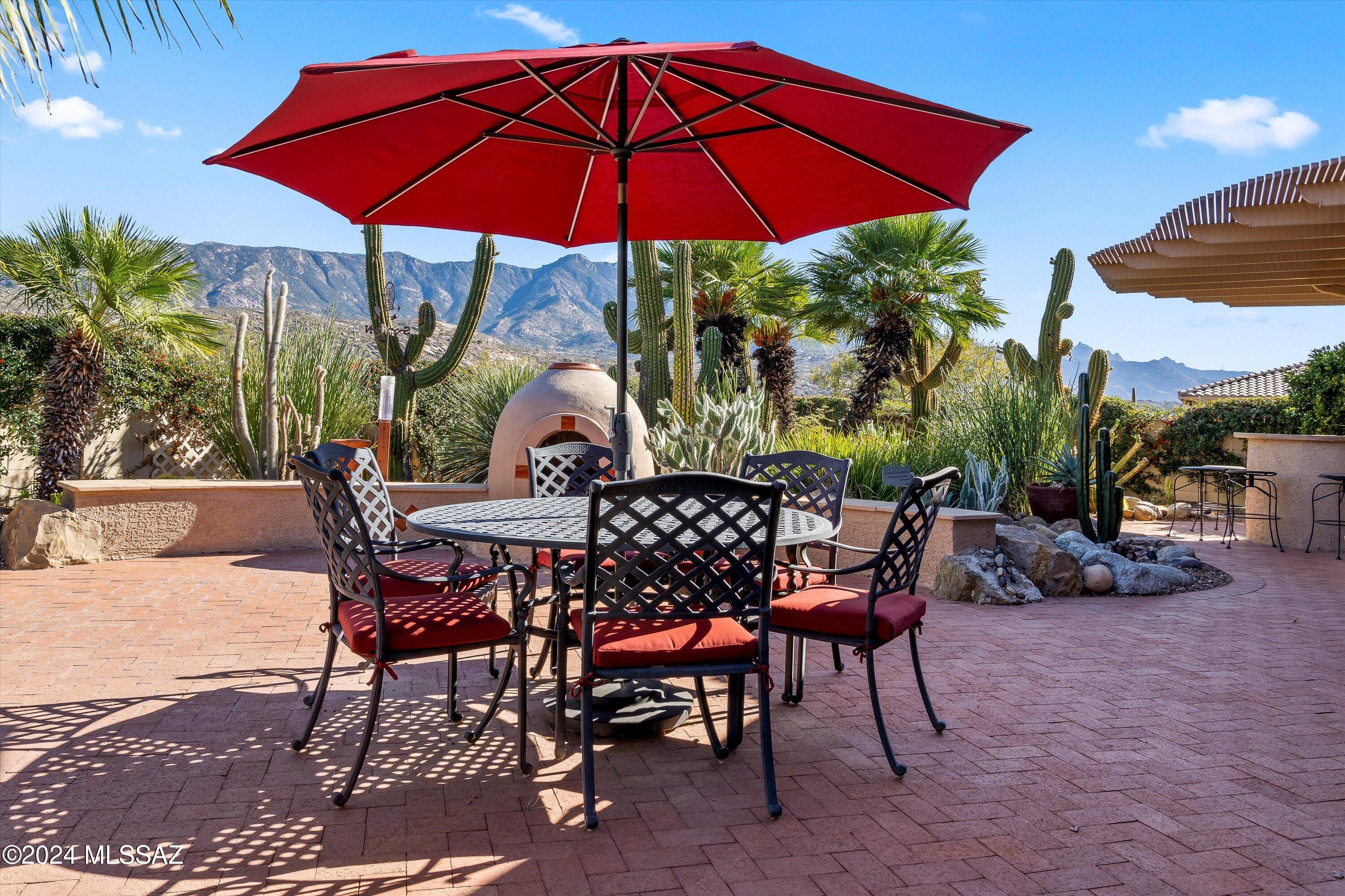 A private courtyard leads to the double door entry of this beautiful Durango model home. Welcoming open gathering and dining space is ideal for entertaining and leads to the large, open island kitchen and family room with kiva fireplace for cool SaddleBrooke evenings take full advantage of the beautiful mountain views. Spacious Owner's retreat with sitting area for enjoying those quiet times. En-suite has been updated with executive height double vanity, large walk-in tile shower and spacious closet. The upstairs casita has two large bedrooms and bath providing your guests with plenty of room and privacy. A convenient den with custom built-ins, powder room and 3 car garage complete this wonderful home. The covered patio has built-in BBQ, a Kiva fireplace, and extended hardscape perfect for entertaining or enjoying watching the ever-changing mountain vistas while enjoying the unparalleled SaddleBrooke lifestyle.