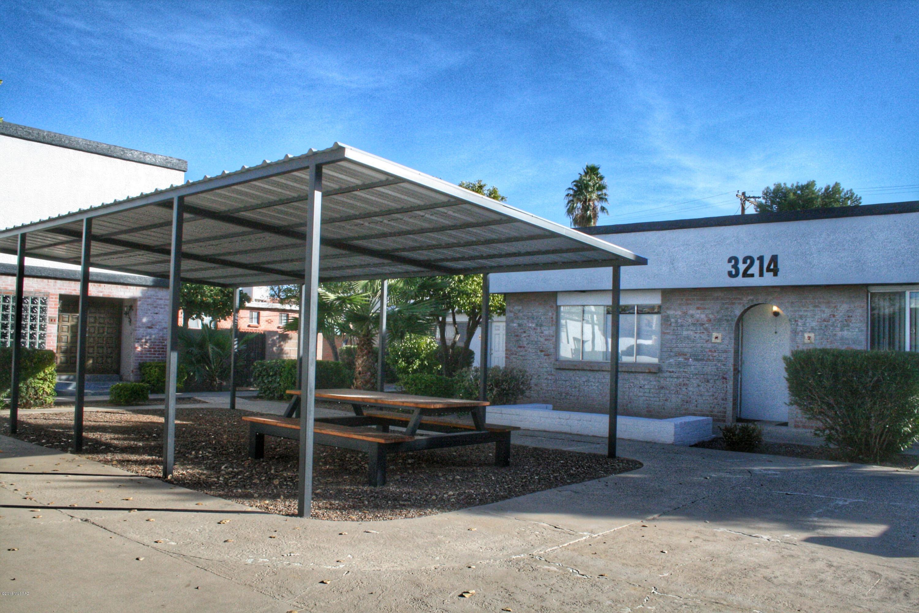 MIDTOWN FLATS! TURNKEY RENTAL OPPORTUNITY. ANNUAL PROPERTY OPERATING DATA SHEET IS ATTACHED!!  11 beautifully-renovated units on over half an acre in top location. This property sits on a charming dead end street on the 3rd St bike path through Sam Hughes and the UofA. It has undergone a thorough renovation including the construction of a brand new unit. New roofs, many new HVAC's, lots of new plumbing and electrical related to new construction unit and a total cosmetic overhaul throughout. All units in great condition. There is considerable upside to market rents, since many of the new tenants received a discounted rent to compensate for major construction. This is not your typical generic, beige 1980's product. PRIME LOCATION! One of owners is Licensed Agent in the State of Arizona.