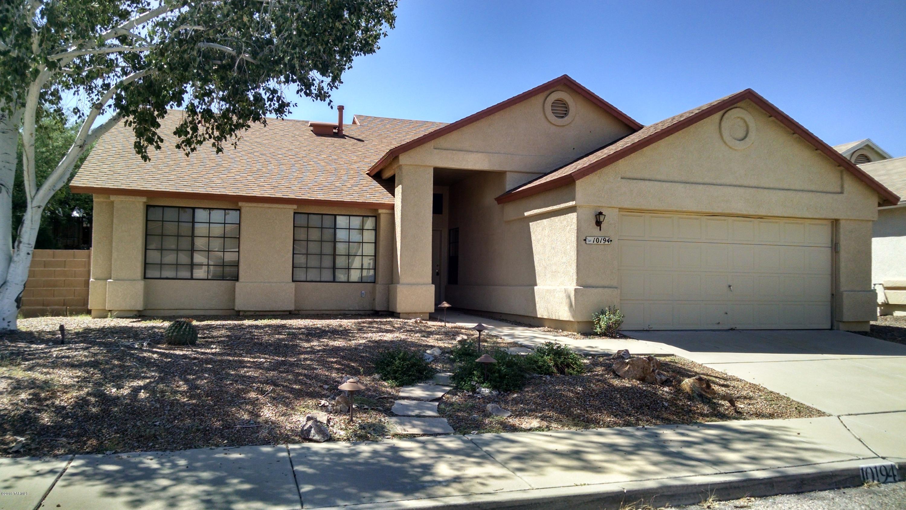 Beautiful eastside home. Vaulted ceilings with a stone fireplace in living room. The kitchen has great granite counter tops with stainless steal appliances. Lots of storage space. Beautiful hard wood floors running through most of the house also with tile and carpet. Large master bath with walk in closet. Duel cooling AC/Evap. Large pebble Tec pool. Nice covered patio and built in outdoor grill. This home is a must see.