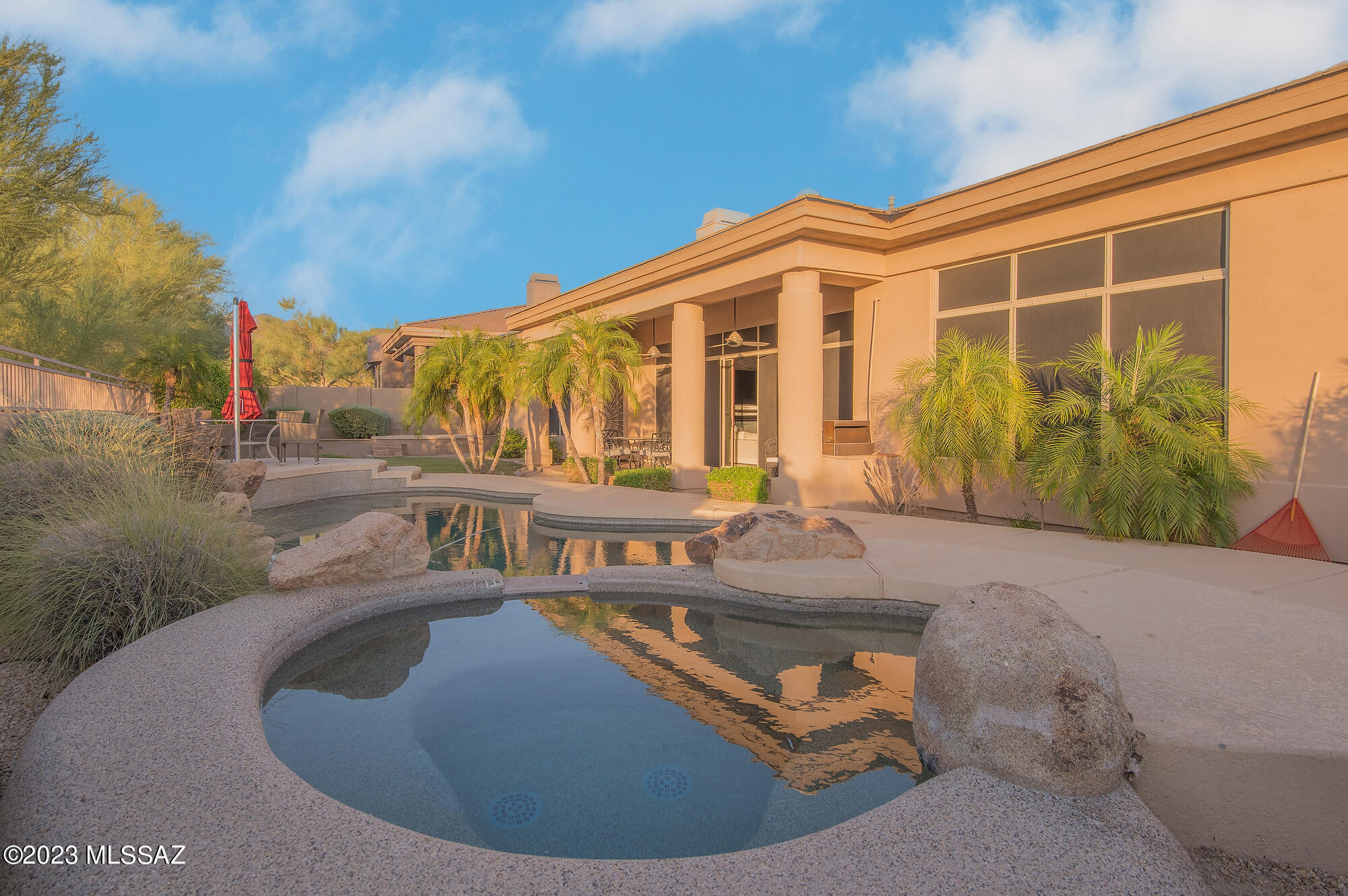 Situated in the gated Cimarron Hills neighborhood of McDowell Mountain Ranch, this sprawling five bedroom home offers the finest in luxury Scottsdale living. Enjoy vaulted ceilings, panoramic views, and upgraded finishes. The gracious kitchen is a chef's dream with Island, peninsula, quartz counters, and marble backsplash. Plantation shutters, modern lighting, and fresh interior paint make this well cared for home feel brand new. The primary suite has an extraordinary walk in closet, spacious bath, and private exterior door to enjoy the atop or spa. Four additional bedrooms and a fabulous flex space for work or play complete this wing of the home. 3 gar garage, stunning yard with pool, spa, and numerous entertaining spaces. Just minutes to shopping, restaurants, and community amenities.