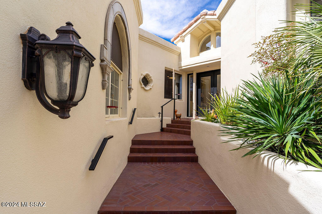 Skyline Country Club at it's finest! Unparalleled mountain and golf course views that draws you in as you walk through the front door.  It really is dramatic, yet it is private as you step out onto the back patio.  This home has a contemporary feel with all of the upgrading done. You will enjoy the fresh custom interior paint , granite counters throughout, high ceilings and a main suite bath that boasts a relaxing soaking tub and a spacious shower. The lighting throughout is upgraded, 2 2-way fireplace in grt rm and main bedroom. The remote-controlled rolling shutters are an additional benefit in main bedroom. The kitchen subzero refrigerator and plenty of cabinetry There is 2 bedrooms downstairs and a loft upstairs that can be whatever your heart desires. workout room, office or bedroom. This is year around living or winter home living at its finest!.