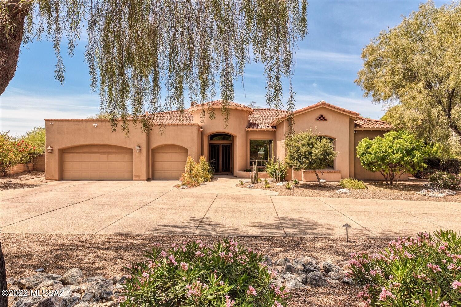This gorgeous SW contemporary home w/fabulous backyard oasis & expansive mountain views is tucked back on a cul-de-sac lot in the sought after gated commty of Pinnacle Ridge.  You will love the huge picture windows, sky high ceilings, solid wood doors, slate tile accents & many other incredible finishes from the moment you enter this meticulously maintained home.  The stunning open island kitchen designed  for entertaining features brand new induction cooktop, granite counters, handsome cabinetry plus a lovely bkfast nook.  Huge Mstr Ste boasts more picture windows, dual sinks, garden tub, walk-in shower and spacious walk-in closet.  Experience spectacular outdoor living w/lg large covered patio, gazebo, built-in BBQ, gas FP, beautiful water feature & well manicured lawn and landscaping.
