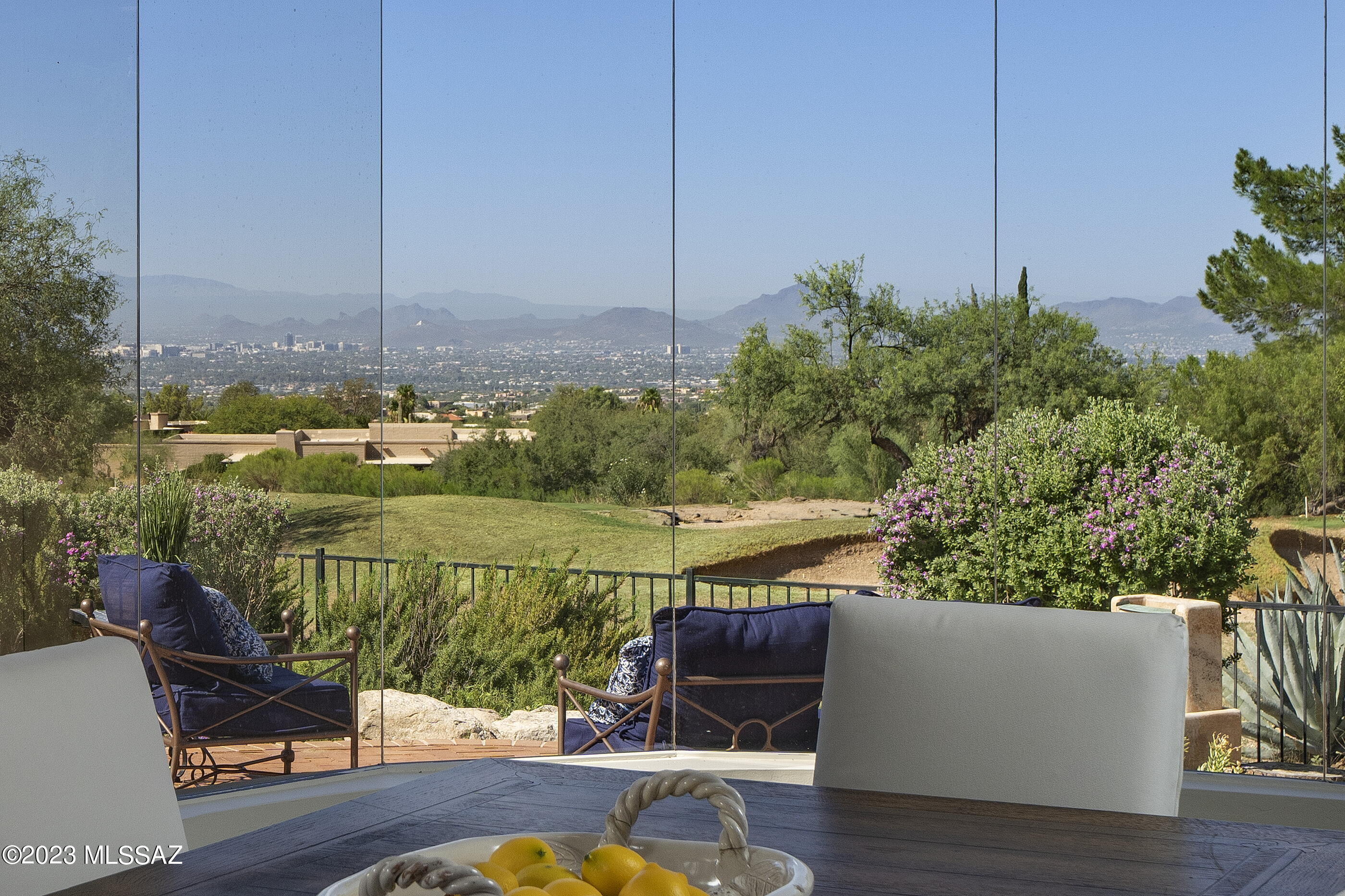 Updated,  Move-in Ready Luxury Home with ''Casita'' on Fabulous Golf Course Lot in Guard Gated Skyline Country Club. 
 Privacy, City & Mountain Views! 
 Expansive Patio Living and No Interior Steps.  Smart, Contemporary Floor Plan features a Deluxe ''Casita-style'' Guest Quarters w/ Private Entrance & Patio, Kitchenette & Gas Fireplace.  Eye-catching front & back elevations.  Dome-Vaulted Formal Entry.  Light-filled Great Room seamlessly transitions to Multiple Patios and wide-open views ''To Infinity and Beyond!'' Gracious Dining Rm. with Unique Bowed Window and the ideal Gourmet Kitchen w/ 5-Burner Gas Cooktop, Double Ovens, Warming Drawer and Pot Filler.  Secluded Owner's Suite with Gorgeous Bathroom in Marble Tile & Natural Stone.  Adjacent Den w/Patio and Mt Views.  It's a Jewel! You'll love living here!  Skyline Country Club is a Guard Gated Community carved into the Foothills of the Santa Catalina Mountains, where you can enjoy some of the most spectacular scenery of any golf course community in the southwest.  It's close to everything, yet away from it all.  Limited Country Club Amenities are included in your HOA dues.  The ideal lock-up-and-go residence, perfect for seasonal or year 'round living.

This home has been pre-inspected.  Skyline Country Club Golf Course currently undergoing renovation and will re-open in November.