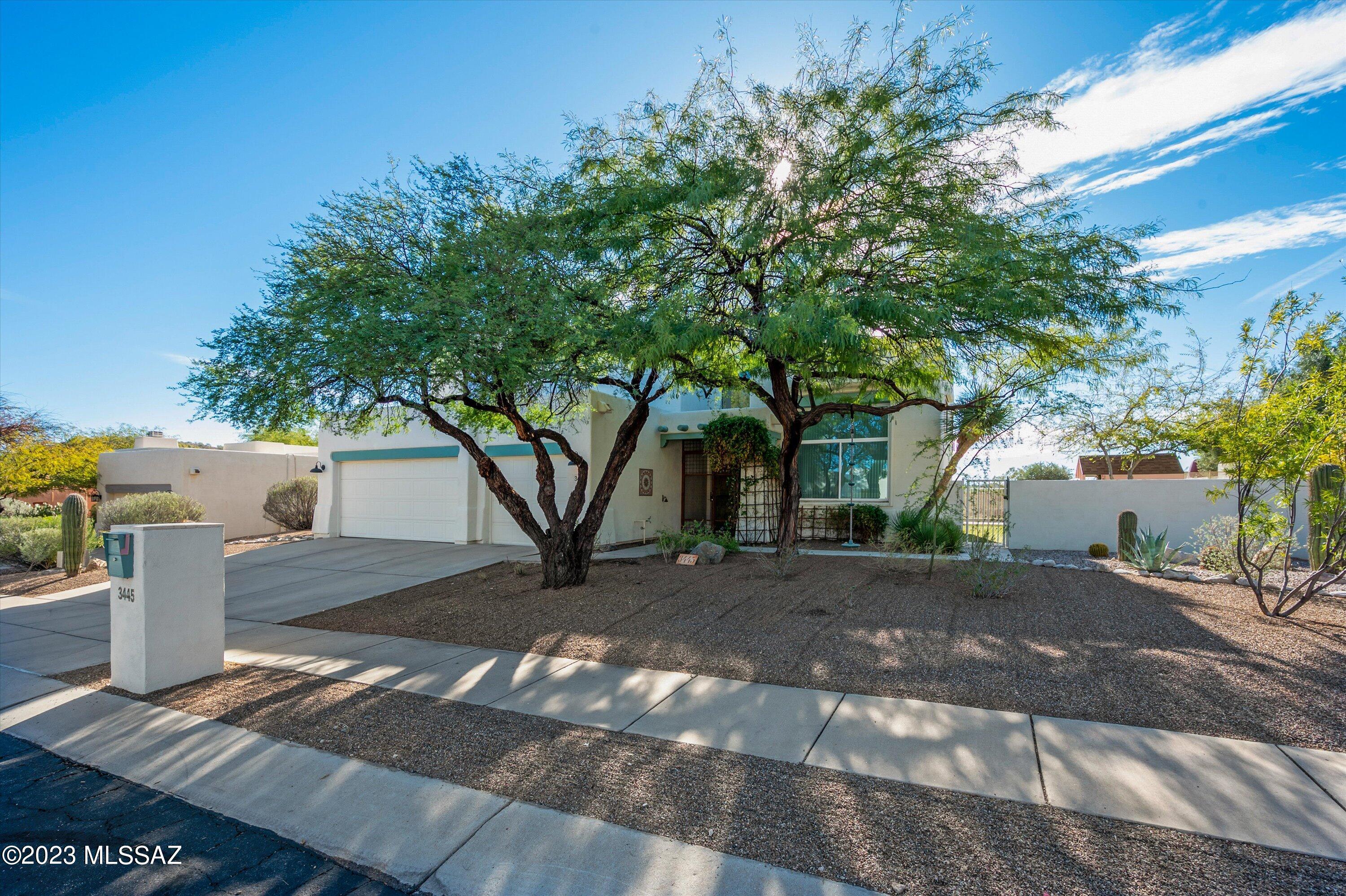 Amazing golf course & mountain views in desirable Starr Pass. Walk in to tall ceilings & views from every window. Kitchen offers updated granite counters, tons of cabinet space & plenty of work space. Kitchen opens to family room w/fireplace. Downstairs features separate living room & formal dining room. Guest bedroom & bathroom downstairs. Upstairs owner's suite is large, bathroom w/garden tub, separate shower, dual sinks & walk-in shower. 2 bedrooms, full bathroom & laundry upstairs. 3 car garage, dual zone heating/cooling & NO POLY PIPES! Large backyard w/mature vegetation, large covered patio & great golf course views.  Golf ball net to protect your windows. With Fire pit in backyard. Brand new Pool! Experiance JW Marriott resort & golf.