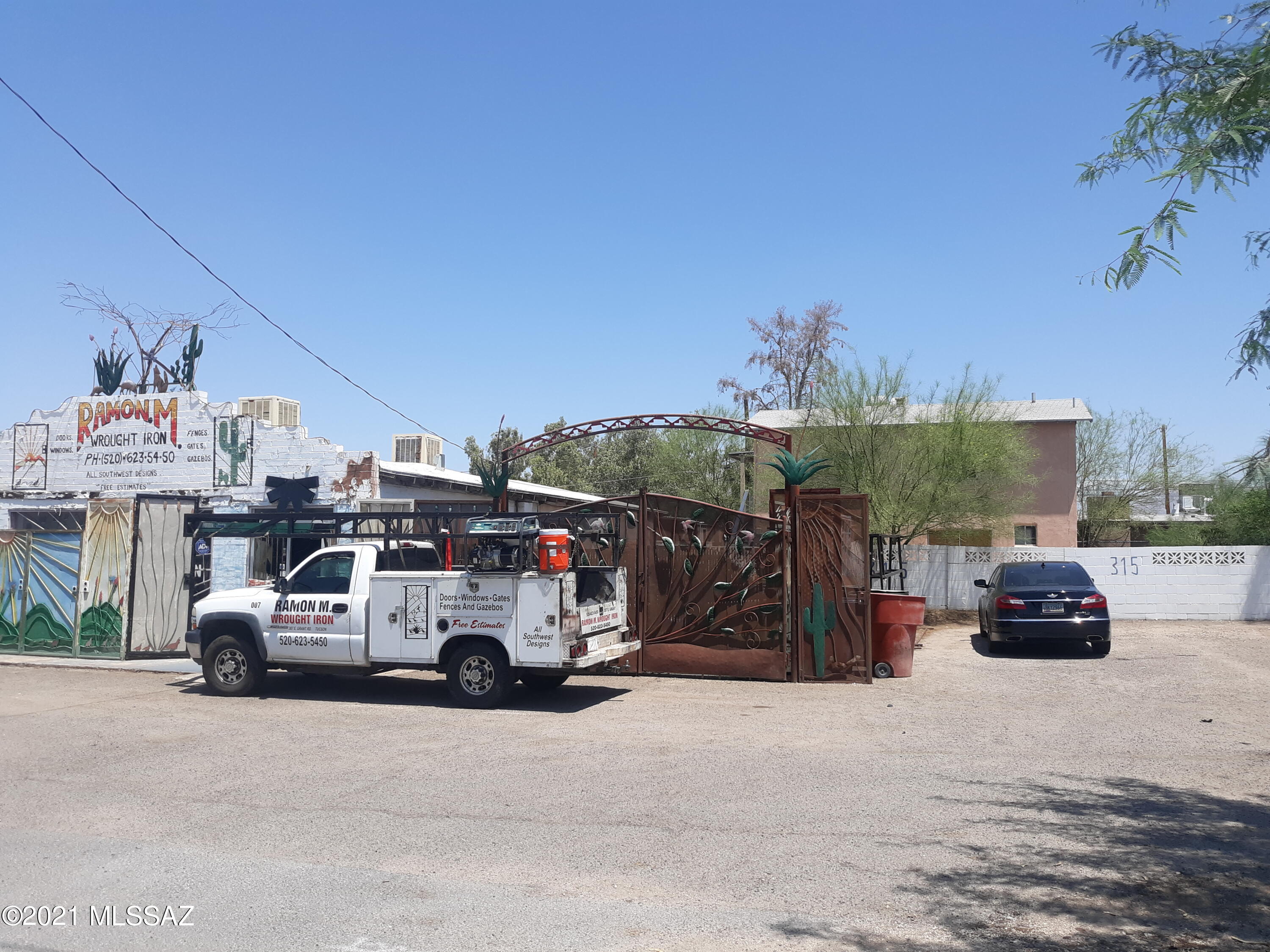 Two adjacent properties must be purchased together. Both are zoned C-2 with 90' of Grant Road frontage. The buildings can be remodeled and repurposed or demolish them and build new. 307 E Grant is a retail building currently occupied by a wrought iron company with 1500 sqft renting for $1000 per month. 315 E Grant is a two story duplex with 1200 sqft currently vacant and will need repairs. The lot immediately west is owned by the city from the grant road widening and possibly available for purchase. Contact the city for additional information.