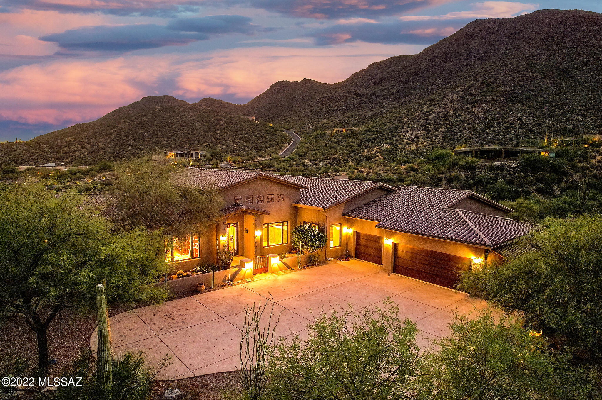 THIS 5,143 SQ. FT. LUXURIOUS EXECUTIVE SPECTACULAR HOME, ON PREMIUM 2 ACRE LOT, IS LOCATED IN THE SOUGHT AFTER EXCLUSIVE COMMUNITY OF CANYON PASS, WITH MANNED SECURITY ENTRANCE!  THIS MASTERFULLY LAID OUT HOME IS FOR THE DISCERNING & ASTUTE BUYER THAT DESIRES PRIVACY & SWEEPING PANORAMIC PRISTINE MOUNTAIN VIEWS. THE WORLD RENOWNED GALLERY GOLF & SPORTS CLUB AND THE RITZ CARLTON RESORT ARE ONLY MINUTES AWAY! THIS HOME IS NOT A DIAMOND IN THE ROUGH IT IS ''A REAL DIAMOND''

THE ENTRYWAY IS MASSIVE AND LEADS INTO THE LARGE AND COZY LIVING ROOM, FEATURING A ROMANTIC FIREPLACE, BUILT IN BAR, AND SPECTACULAR VIEWS. 
THE CHEF'S KITCHEN OFFERS GAGGENAU DOUBLE OVENS W/ WARMING DRAWER, VIKING RANGE, VIKING REFRIG/FREEZER, 2 DISHWASHERS, MAIN & PREP SINKS, GRANITE CNTRS, ALDER CABINETS, & LARGE PA THERE IS A SPACIOUS DINING ROOM WITH AN ADDITIONAL DINING AREA IN THE KITCHEN. 

MASTER BEDROOM INCLUDES A FIREPLACE, HIS & HER'S WALK IN CLOSETS. MASTER BATHROOM FEATURES TUB & SHOWER WITH A FIREPLACE! THE OTHER THREE BEDROOMS AND BATHS - YOU WILL HAVE TO SEE TO BELIEVE HOW WELL LAID OUT THEY ARE! A LOGICALLY LOCATED CLEAN UP ROOM WITH SHOWER IS CONVENIENTLY LOCATED NEXT TO THE 5 CAR GARAGE WITH WORK PLACE WITH SINK.

THE EXECUTIVE OFFICE HAS FULL CUSTOM WOOD SHELVING.
LARGE LAUNDRY ROOM! 
EXQUISITE WOODWORK THROUGHOUT THE HOME.
 AMAZINGLY CUSTOM DESIGNED POOL, JACUZZI, OUTSIDE FIREPLACE AND BEAUTIFUL FIRE PIT. 
EVERYONE THAT SEE'S THIS HOME WILL FALL IN LOVE WITH IT.