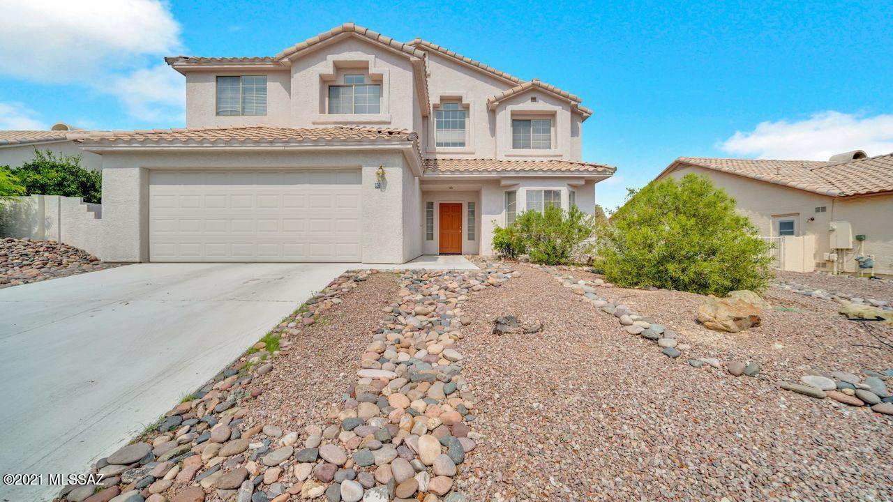 This spacious contemporary home w/pool is a must see!  Located in the desirable Silverado Hills community.  High ceilings, lots of lighting, fireplace in FR and a grand curved staircase!  The kitchen features stainless steel appliances, built in microwave and lots of counter space.  Split bedroom plan.  Owner's Suite includes sliding door to private balcony, arched doorway to ensuite with soaking tub & separate step-in shower.   Private entertainer's backyard includes an extended covered patio, fenced in sparkling pool, spa, built-in BBQ grill, covered gazebo, dog run and amazing mountain & sunset views, no rear neighbors.  This 2-story home even comes with an Acorn Stairlift for anyone needing extra assistance with the stairs!  One of the largest lots in Silverado Hills**