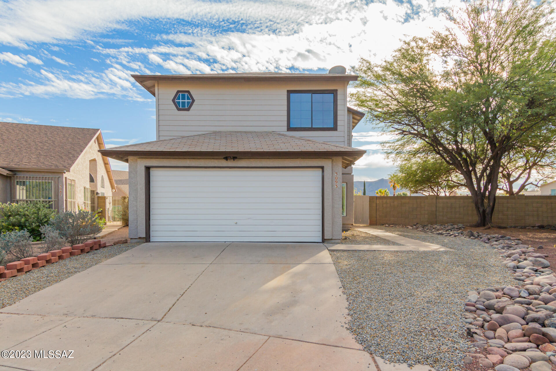 Introducing this fabulous home tucked in a serene cul-de-sac! The freshly painted interior, wood-look flooring, high vaulted ceilings & chic light fixtures. In the kitchen, you'll discover stainless steel appliances, white cabinets, granite counters, stylish tile backsplash, and a 2-tiered breakfast bar. All flooring upgraded in 2023, kitchen cabins and appliances upgraded in 2023. Bathrooms remodel in 2023. The impeccable primary bedroom includes sliding & mirrored door closets and an elegant bathroom with two vanities for added convenience. The sizable bedroom and bathroom downstairs are ideal for guests. Generously sized backyard boasts a covered patio ideal for relaxing and mature trees that provide refreshing shade. Don't hesitate to make this turn-key beauty your own!