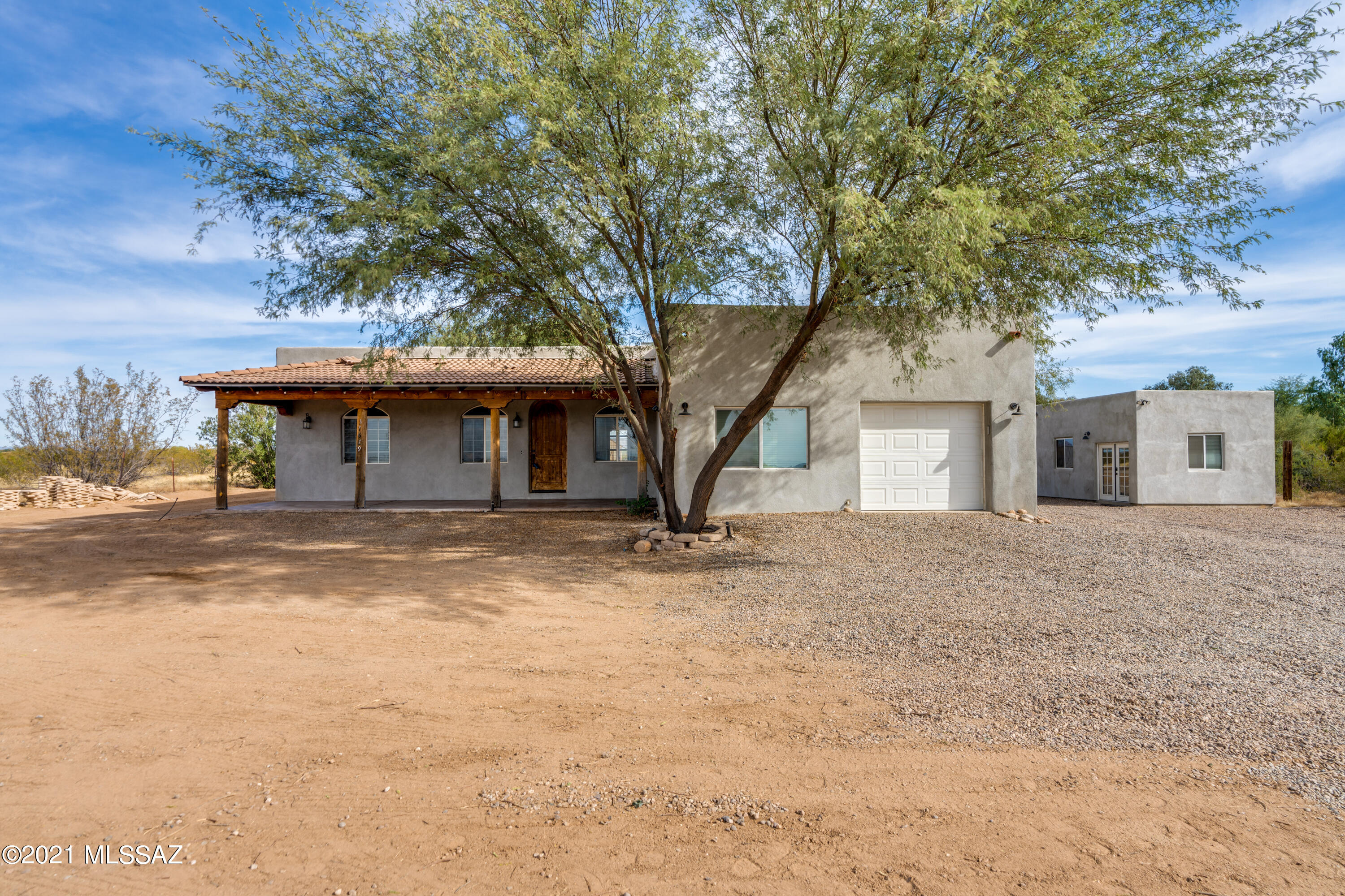 Seller will accept or counter offers between $350,000-$375,000. Quiet country living at its best! Beautifully remodeled 2300 sqft home featuring wood plank tile flooring throughout. Beautiful kitchen with custom 42'' cabinetry, travertine counters & stainless steel appliances. Spacious & stunning owner's suite & bath spa shower & custom walk-in closet. Split bedroom floorplan with 4th bedroom ensuite bath. Large interior laundry. 300 sqft detached bonus room fully finished and ready for whatever your needs are. Additional storage shed & workshop containing water & 200 amp service. Full RV hookup on this 1.25 acre lot with room for all the toys. No HOA, horse property.