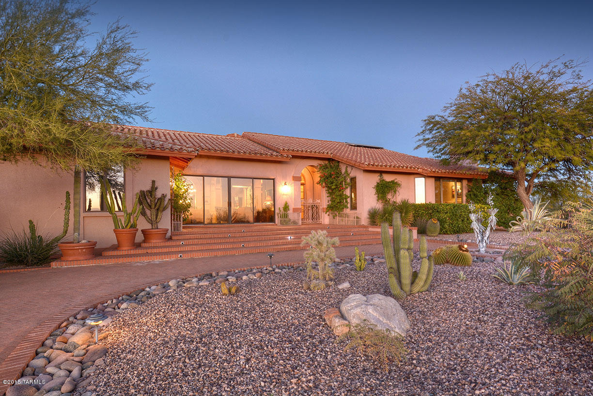 Sellers will accept or counter offers between 880K-925K. Over $500K in upgrades since 2007! Elevated premium view lot boasts gorgeous mountain and/or city views from each of 4 patios! Gaze out onto the city lights from 34 X 14 master suite w/wood beam ceilings & wood burning FP! Granite island kitch w/ adjoining brkfst rm & office!$100,000 backyard oasis w/2007 solar heated salt water Pebble Tech pool, Jacuzzi & waterfall, extensive masonry work, custom BBQ & wood burning FP! Guest qrts incl. kitch & full bath!  Exercise/sitting rm off mst ste! Triple zone heating & AC, tile roof, elongated aggregated driveway, 3 ½ car epoxy painted garage & 16x10 wine cellar! 20 year solar lease is completely paid, with approx. 15 years remaining! Your gas & elec bills will hold steady at approx. $25.