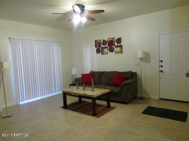 Oro Valley Resort Style Living-Walk to shopping and restaurants from this charming 2bdr/1ba Fully Furnished condo at The Boulders at La Reserve. Minutes Catalina State Park, Oro Valley Market Place, Innovation Park and Oro Valley Hospital. Home is located right across from the sparkling pool/spa/fitness area. Ground floor unit w/all appliances. New tile floors throughout-no carpet. Water and Trash provided.