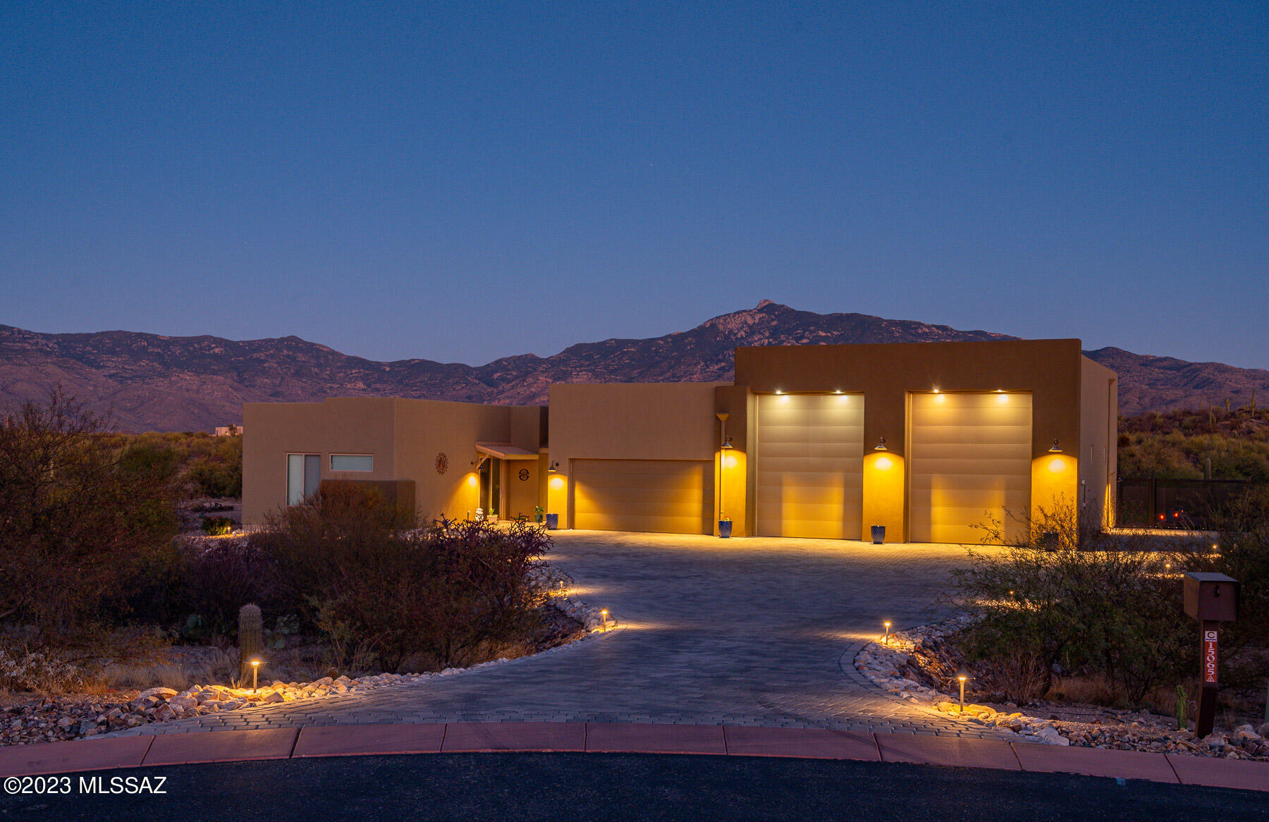 This gorgeous masterpiece of a contemporary-modern luxury home won't disappoint! New custom home built in 2022. Located in the wonderful and prestigious community of Coyote Creek! Sitting on 2.29 acres with breath taking views of the Rincon Mountains that will enlighten your evening sunsets and morning sunrises! This backyard will bring you the desert oasis that you have only dreamed of! A delightful, stunning, modern style salt water pool with pebble tec coating, lighting, heating, modern cool-decking and a power safety cover over the top that can also be locked! After a nice dip in the pool, you'll be able relax and enjoy the warmness over a fabulous firepit sitting on top of a wonderful and a spectacular layout of architectural pavers, turf, decorative gravel and desert plants to bring you the backyard peace that you have always dreamed for! 

This amazing and eye-catching custom home includes 2x6 construction, energy efficient windows throughout, R-7 value spray foam insulation in all walls and ceiling, skylights, window shutters, 10-foot ceilings, tankless water heater, water purifying system for the whole house! When you open that gorgeous front door, you will automatically fall in love with a spectacular and entertaining open/split floor plan that will give the unique combination of privacy and entertainment for yourselves and all of your guests! An abundance of stunning porcelain tile that is laid out throughout the home. This home is positioned perfect to offer you 3 bedrooms and 4 bathrooms which are all en suites..AKA Mother-In Law Suites! All bedrooms include large walk-in closets, excellent lighting, fabulous window-shutters and awesome window views of the Sonoran Desert, Sahuaros and Cacti, and Mountains! Dine, Wine and Captivate all of your guest in this astonishing gourmet kitchen that includes large  custom white cabinetry with stylish crown molding! Stainless appliances with gas cooktop, large island, marvelous granite countertops and a HUGE walk-in style pantry to fit all of your bulk items and groceries! 

Did I mention the RV Garage?? 1500 square feet of total parking!! Bring and park all of your fun toys like boats, side by sides, quads, dirt bikes, toy haulers , trailers and RVs. Garage includes spray foam insulation in walls and ceilings, L.P concrete floors, air compressor hook-ups, high ceilings, custom paint and lots of shelving for all of your tools and equipment. OR turn this unique garage into your dream GYM, work-shop or wood-shop! 

This miraculous home also includes a High-Powered Solar System that will give you the electricity and power to run your entire home! NO financing, no lease, completely seller owned! Take advantage of all your utility cost and more! 

Dont forget about the unique and distinctive community that you'll be living in! Coyote Creek offers so many entertaining and outdoor activities such as pickle-ball, basketball and tennis courts, jogging paths, hiking trails, REC Center and a nearby Equestrian! Don't miss out on this GEM of a LIFETIME!!