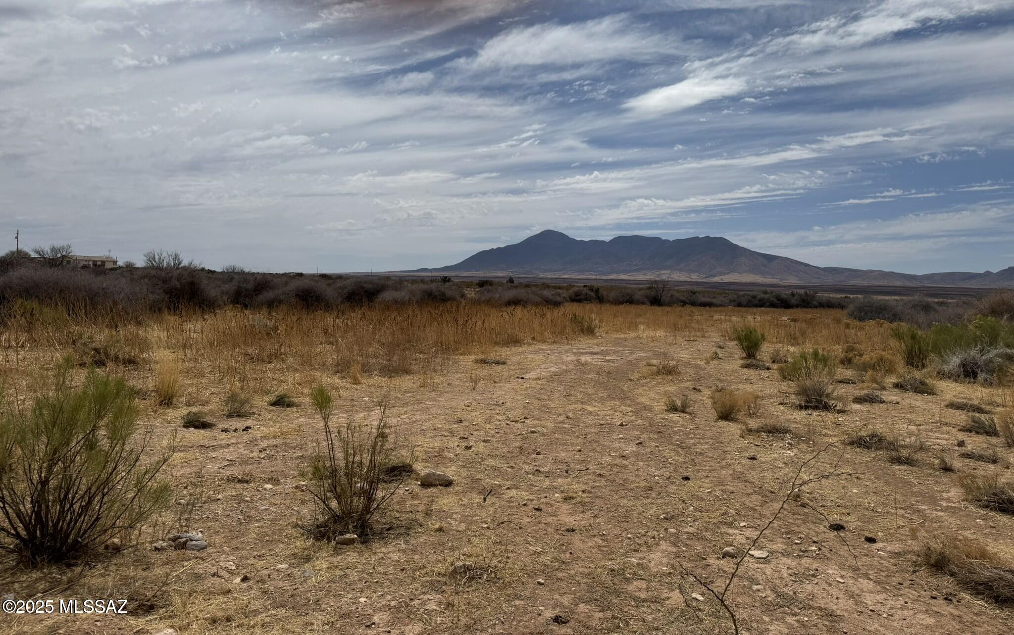 This unique 7.48 Acre property is waiting for you to make your own. Enjoy the history of Bisbee and Tombstone. Sellers are motivated. Don't miss out.