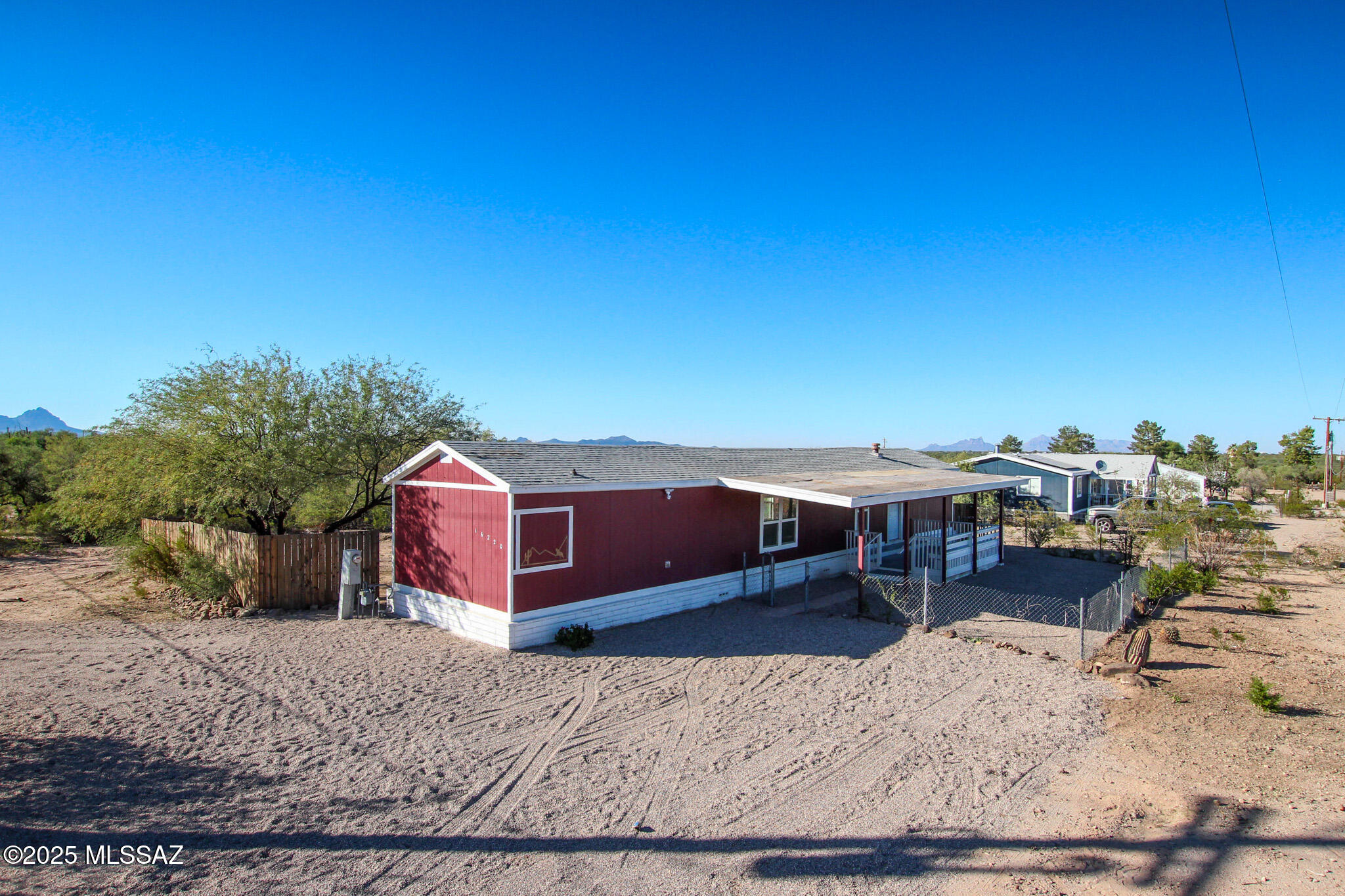 Experience the charm of rural living just minutes from town! This beautifully remodeled 2-bedroom, 2-bath home offers 952 Sq Ft of comfortable living space on a spacious lot where horses are welcome. Enjoy a peaceful desert lifestyle with plenty of room to roam, just 10 minutes from downtown Marana and quick access to I-10 for easy commuting. Updated throughout, this home features a fresh modern feel while keeping its cozy country character. Whether you're looking for a private retreat, a small ranch setup, or an affordable escape from city life, this home delivers the perfect blend of space, style, and serenity.