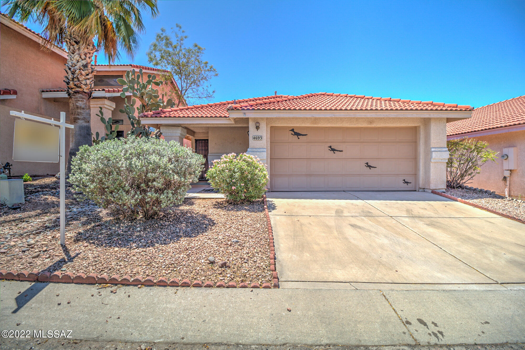 Sweet updated Contemporary home in Country Highlands Subdivision with new carpet, new interior paint, updated fixtures!  Open floor plan with lots of light! Two bedrooms, two full baths and a den with glass french doors (could easily be a third bedroom).  2 car garage, laundry room and a Lovely back patio with city/mountain views!  Community pool in the neighborhood and only $45.00/month HOA dues which covers the pool, the sewer, the street maintenance & common area.