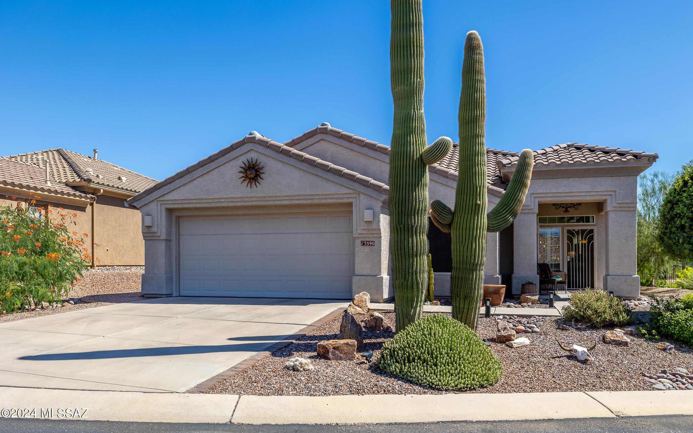 Location, Location!  Almost isolated private retreat. This extended Medford (extensions in guest bedroom & laundry room) is located on quiet Nightstar Court - a street that backs to natural desert habitat and golf course. This home is located near the lady's tee. Rarely (if ever) a golf ball in your yard. Newly installed fencing secures your backyard-all w/view fencing!  Carpet in bedrooms replaced in Aug '23 along w/interior paint & epoxy garage floor & new dishwasher all the same year. Fresh gravel spread throughout property in 2024. Easy care & private yard.  Home is very clean, very private, very quiet. Another plus is the golf cart bump out garage.  Currently set up as a workshop- but your golf cart can easily find its home in the alcove.   Call for private showing.