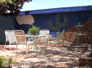 Beautiful 3BR/3BA Sam Hughes area Townhome, located in a lovely community close to UA and downtown. This spacious floor plan provides a breakfast area with a view of the gated front courtyard. Enjoy sitting in the Great Room by the fireplace or gazing through the windows at the stunning mosaic wall in the back patio. Featuring two master suites with full baths upstairs and a third bedroom downstairs with full bath. Storage abounds with a huge interior closet, and additional storage in the two car garage with built in workbench. This is a great rental for anyone looking for a clean, comfortable, low maintenance home close to dinning, shopping in central Tucson. Community also features a refreshing community pool and spa. HOA LIMITS HOME TO TWO VEHICLES