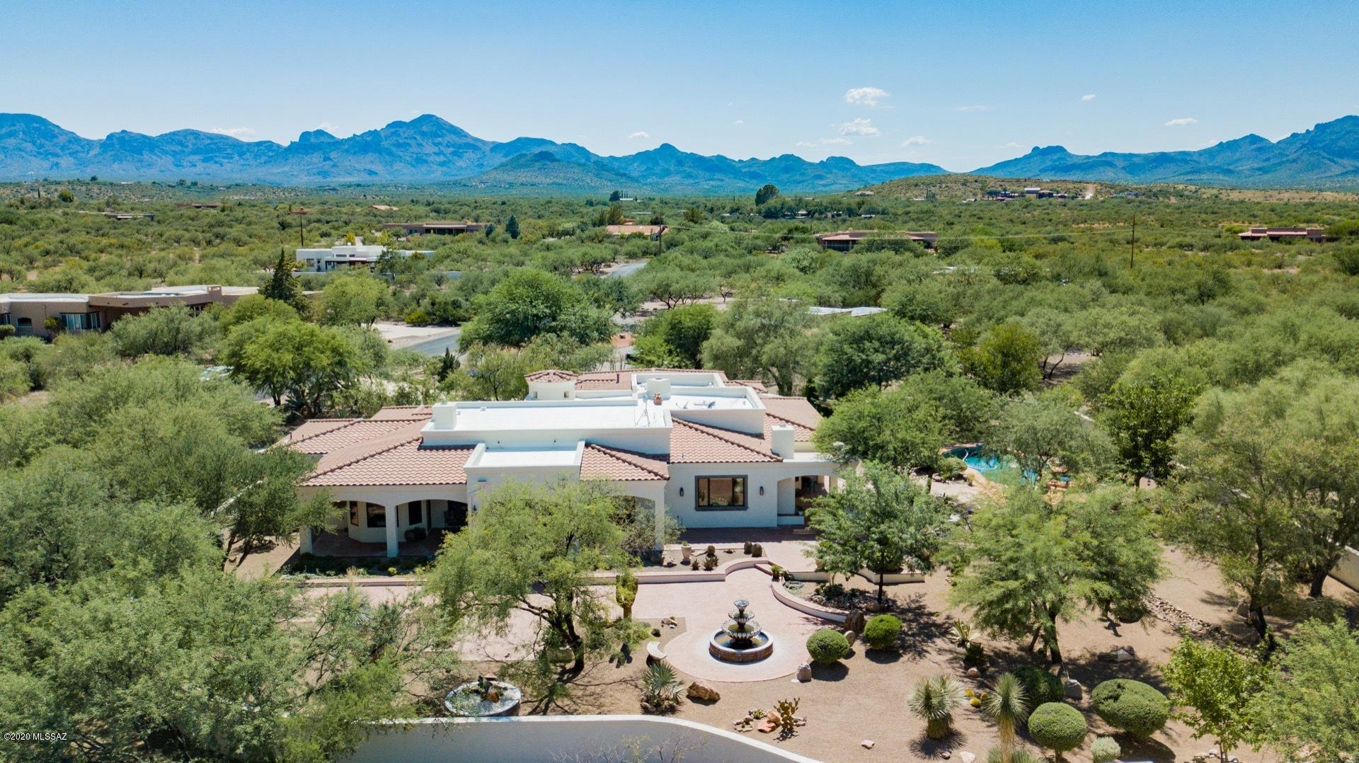 Escape to the peace and serenity of Southern AZ in this extraordinary custom built Tubac Home. This is truly one of the most beautiful homes in Tubac and with over 4000 sq feet on 1..1 acres it provides indoor and outdoor living at its finest. Wet bar and Butler's pantry. Interior ceilings, shelving and finishings that must be seen. Private well with option of water company water. Two  patio areas to the East and North.  New RO in kitchen and new potassium water softener with carbon filter. Wonderfully landscaped grounds with natural desert and hardscape. 3 Car garage with work areas. The large yard is walled with masonry block for your privacy and security. Built in outdoor cooking area with fireplace. Of course there is a pool and spa to complete your private sanctuary.