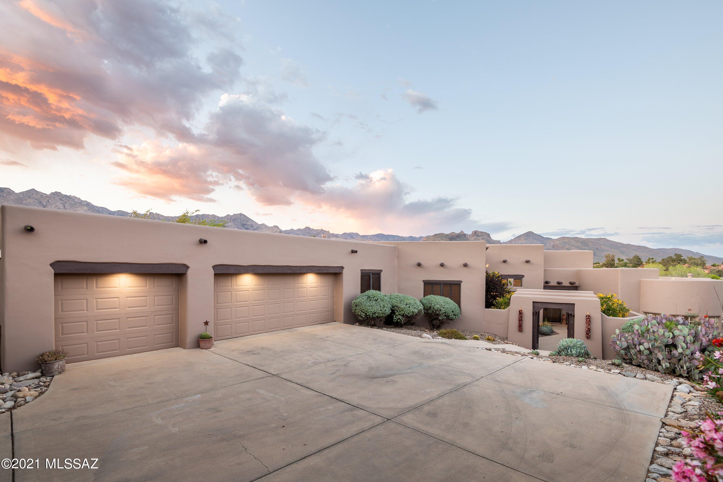 GORGEOUS MOUNTAIN VIEWS you have been looking for! Custom Santa Fe in private gated community of Ventana Ridge & District 16 Schools oozes charm & character w/quality construction & beautiful spaces. Enter  via rustic gated crtyrd w/desert gardens & water feature. Be enthralled by amazing mtn views & entertain indoors or out. Open grtrm w/newer kitchen. Split BR flrpln w/2 ensuites. Wonderful owner suite w/ huge BR opening to patio, enormous WI closet & spacious bath w/custom walkin shower, deep soaking tub, WC, separate vanities, unique design. Saltillo tile, plantation shutters, beehive FP, 3-car garage, VIEWS!!!