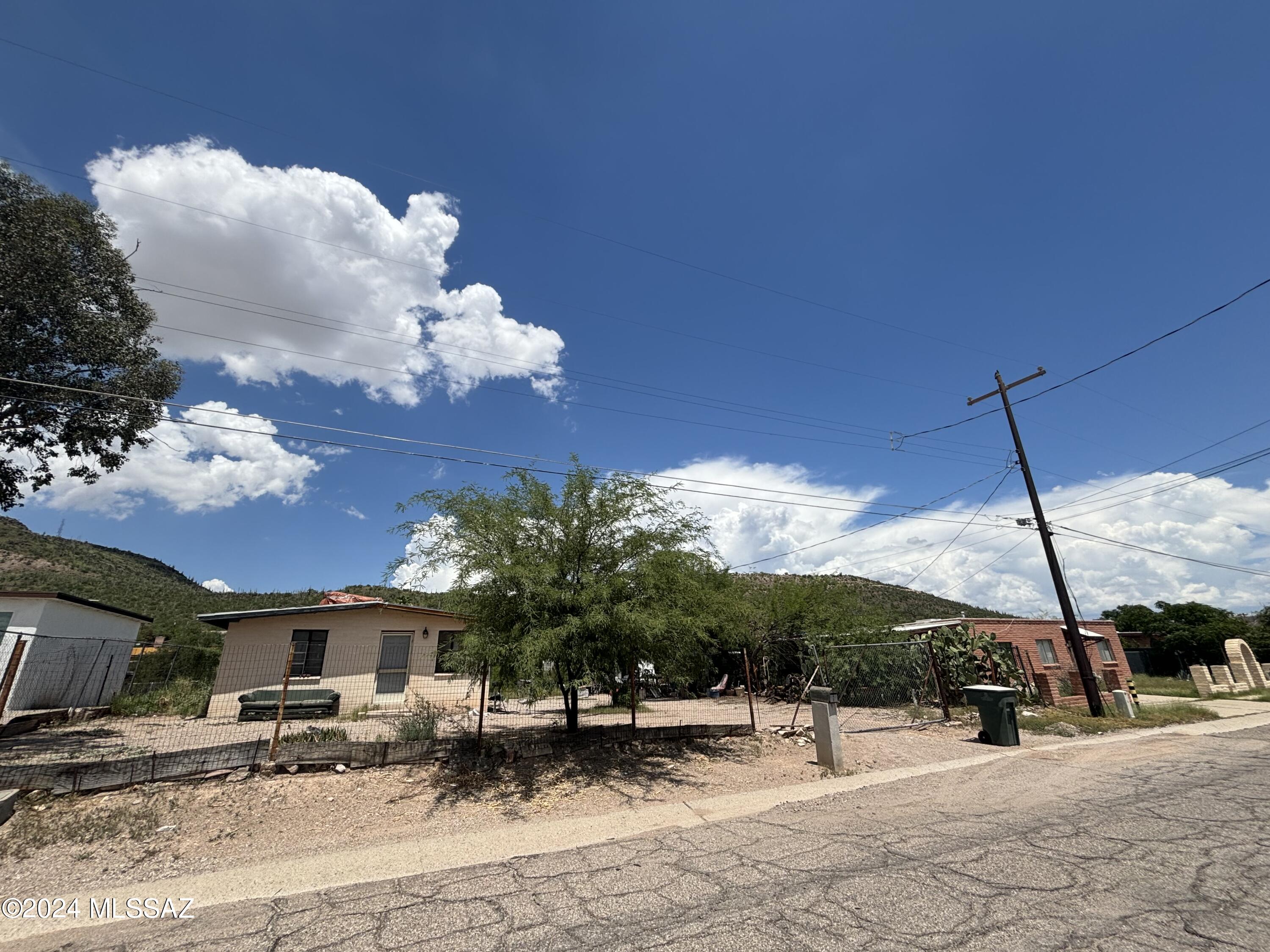 List Range Priced $149,900-$180,000. 2 Bedroom 1 Bath in Amazing LOCATION & Great Opportunity for Investors or Owner Occupants looking for some Sweat Equity, Long term Investment, Short Term Rental, or for their Next Flip!  Many Remodeled, Updated Homes in the Neighborhood & Street including Prior Flips!  HUGE .238 Acre Lot, Outstanding A-Mountain Views, Close to Downtown, Freeway, Starr Passs/JW Marriott Resort & Golf Course, Yearly Gem Show & More!   Solid Block Construction, Upgraded 200 AMP Electrical Panel, and Plenty of Yard Room to Build On or Keep it an Easier Smaller Project and/or do little over time. All Utilities Are On. Water Heater 2023. Great Property Come See today!