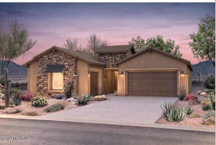 This beautiful Patagonia home design features a glass walk-in shower in owner's suite, guest suite, chef kitchen layout with upgraded quartz countertops and upgraded Latte maple cabinets and flooring throughout home.  The home includes front yard landscaping with the back yard facing common area.