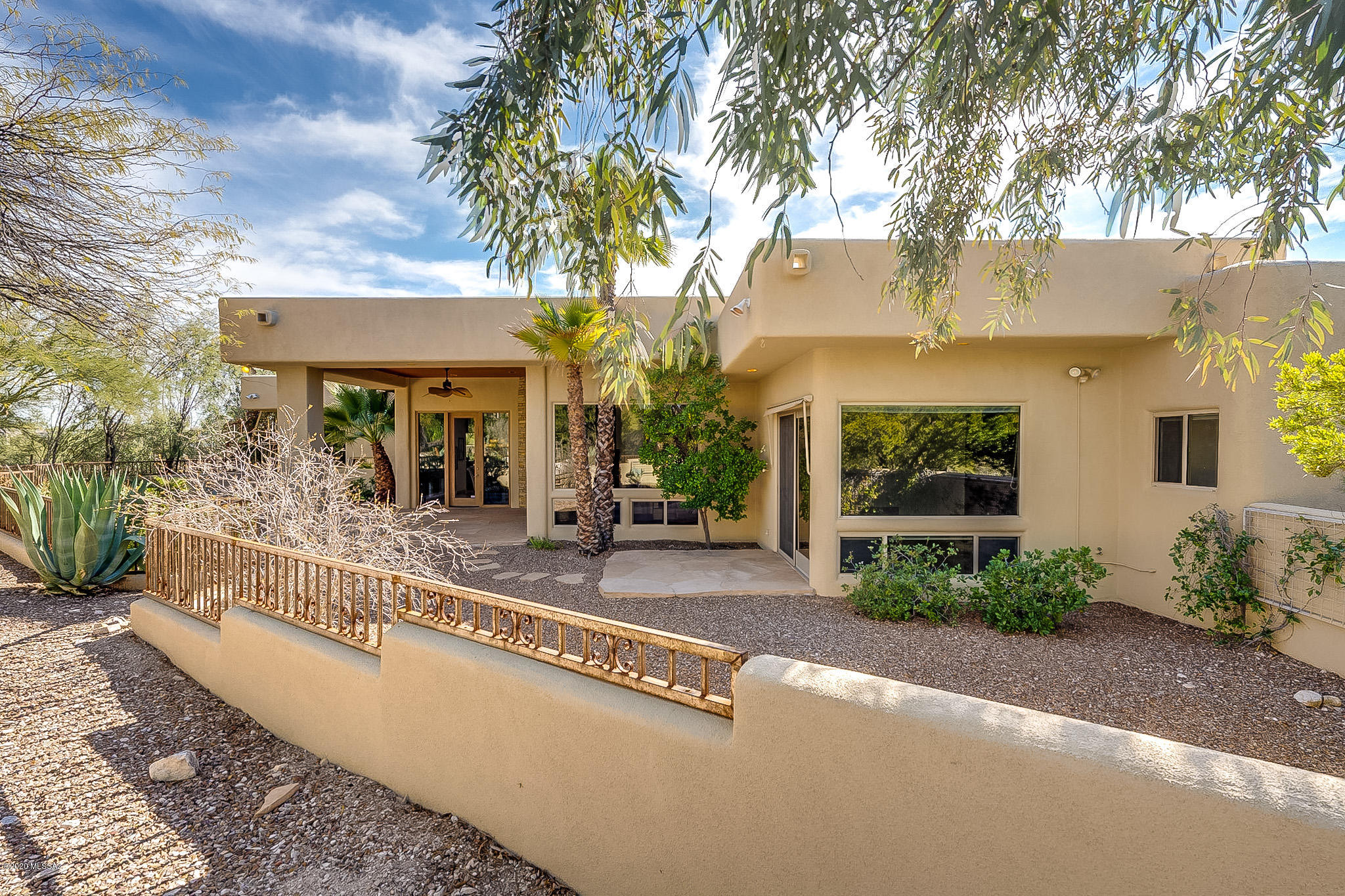 Gated living at it's best.  Enjoy this warm and intimate 3819 Sq. Ft. Home in District 16 School System. 4 Bed.  Distinctive Tray Ceilings, Travertine Tiles throughout (no carpet) 3 Masonry Gas Fireplaces. Great room includes Professional Grade Stainless Steel Appliances, Slab Granite counters, Large Pantry, eat-in Kitchen Dining, Built-in Desk, Gas Fireplace, access to Outdoor Kitchen, Salt Water Pool & Spa, and two separate enclosed Dog Runs. Enjoy a PREPAID Solar Panel Leased System (ask for details) for years to come!