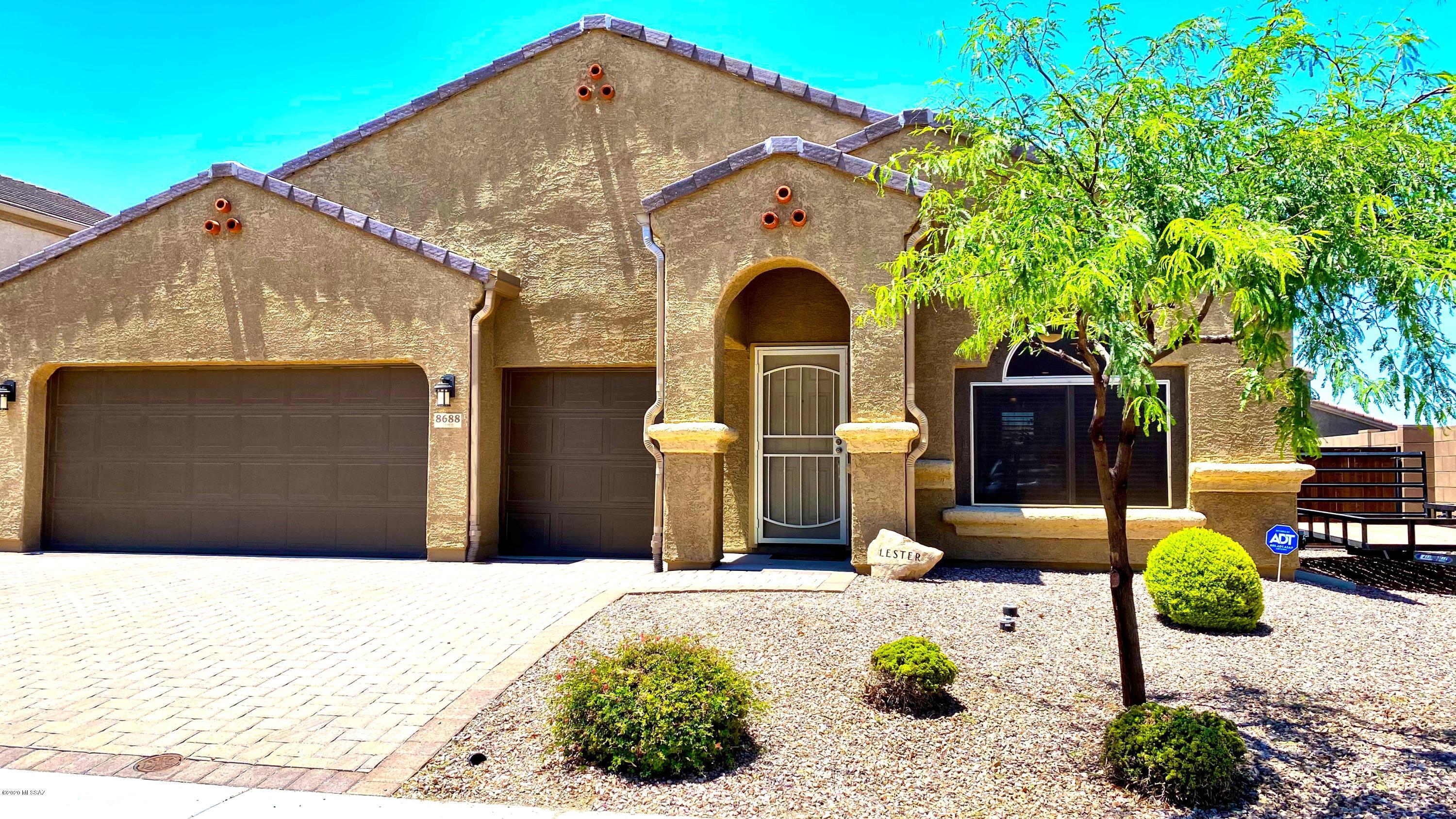 If you've been waiting for THE ONE, this is it! Seller has put it all into this home! Elegant touches everywhere. 3br plus a den. Some of the many upgrades include; Ceramic plank tile in all main living areas, Upgraded cabinets, granite counters, upgraded appliances, 4 stage RO system, Large master with huge walk-in closet with motion sensor, Bathroom vents on timer, Smart thermostat, All LED lights, Ceiling fans, Custom blinds, Front outside lights on timer, ADT security system, Custom blinds...The list goes on and on. Full list of features will be in the ''document's' section of the MLS listing. Step out into the back yard and you'll be greeted by the enormous covered patio, outdoor kitchen with built-in BBQ, refrigerator, sit up bar, and misting system. Ceiling fan and set up for outdoor TV will keep wanting to stay outside! Beautiful Pebble-tec pool with fountain will cool you off in these hot summer days. Mountain views! This one won't last!