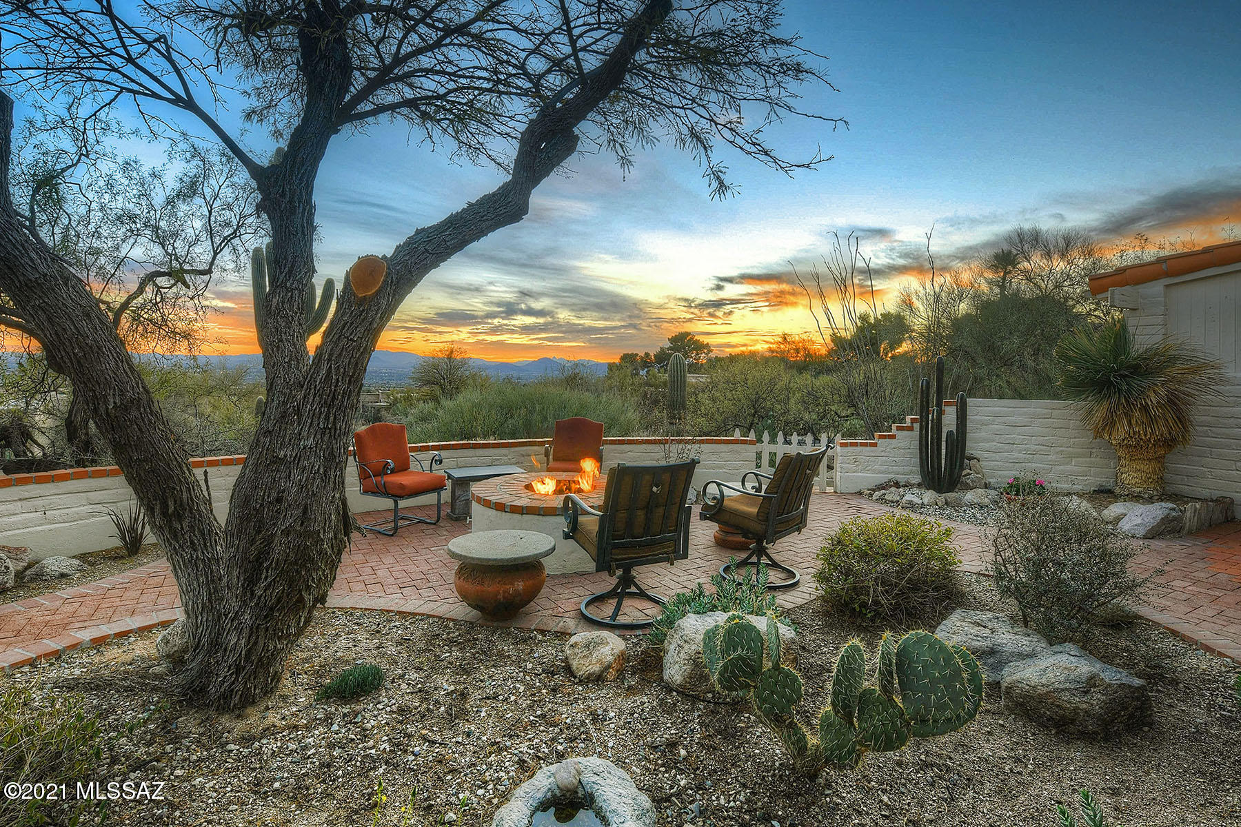 Stunning, FULLY FURNISHED retro style southwestern ADOBE high up almost at the top of the prestigious Skyline Country Club with AMAZING 180 degree views of Tucson below. ALL ON ONE LEVEL, NO STEPS. Completely remodeled in 2010, there are 4 bedrooms/3-1/2 baths. Perfect setup for guests w/a split plan - a separate 3 bedroom/den/2 bath guest wing w/ private patio/AZ room on one side of house & a luxurious master suite w/den & city views on the other side. The new kitchen has tons of cabinets, a dining area, a built in desk w/picture window, & is open to the family room. Spacious formal dining room & living room w/FP have sliders to outdoor patio & city lights. This home is well constructed & energy efficient. SKCC has lots of resident amenities w/o joining club. A TRUE DIAMOND IN THE DESERT price includes all furnishings, linens, most artwork, kitchenware & even the GOLF CART!!!
Skyline CC allows residents to use walking paths before and after golf hours. Residents also get to use fitness center, takeout dining at restaurant, one golf & one tennis round per month and a monthly homeowner appreciation dinner (take out during COVID) that is free.
