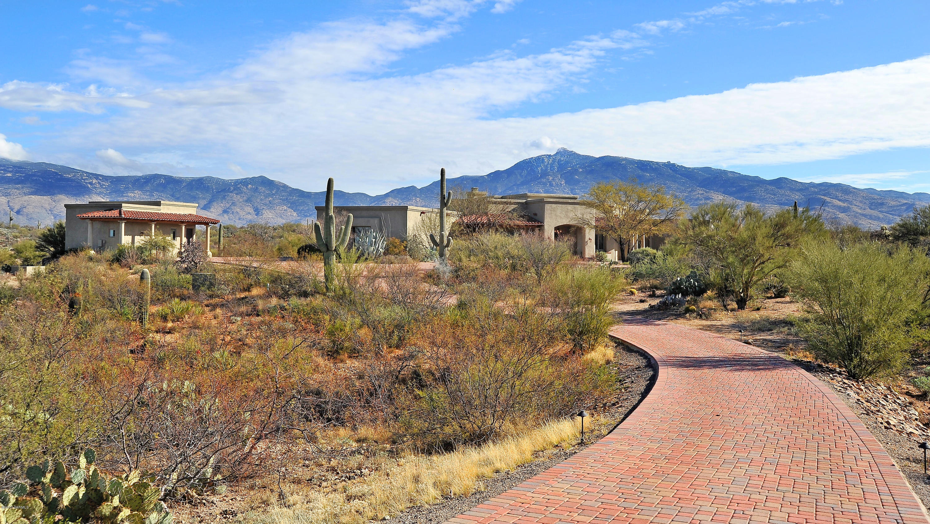 Sensational is not Good Enough to Describe this Home ... Heaven is more Appropriate. Seller started with a Gorgeous Home & Improved it. $160,000 in Upgrades Include Brick Pavers from Street to House, Beautiful Pool & Concrete Patio, Wrought Iron Fencing around Entire Property, Landscaping and Exterior Painting. Outside Offers Stunning 360* Mountain Views, & a Wrap Around Covered Patio Covering the Length of Home. Inside is even more Impressive...Views From EVERY Window, Travertine and Wood Flooring, 10 Skylights, Coved Ceilings, Alder Wood Doors Thru-out, Gorgeous Granite in Kitchen & ALL Bathrooms, Cherry Wood Cabinets, Dacor Appliances Inc. a Six Burner Commercial Stove (w/Spaghetti Faucet). Each BR has its own Bathroom, and Guest House Offers Stained Concrete Floors & of Course, VIEWS!!