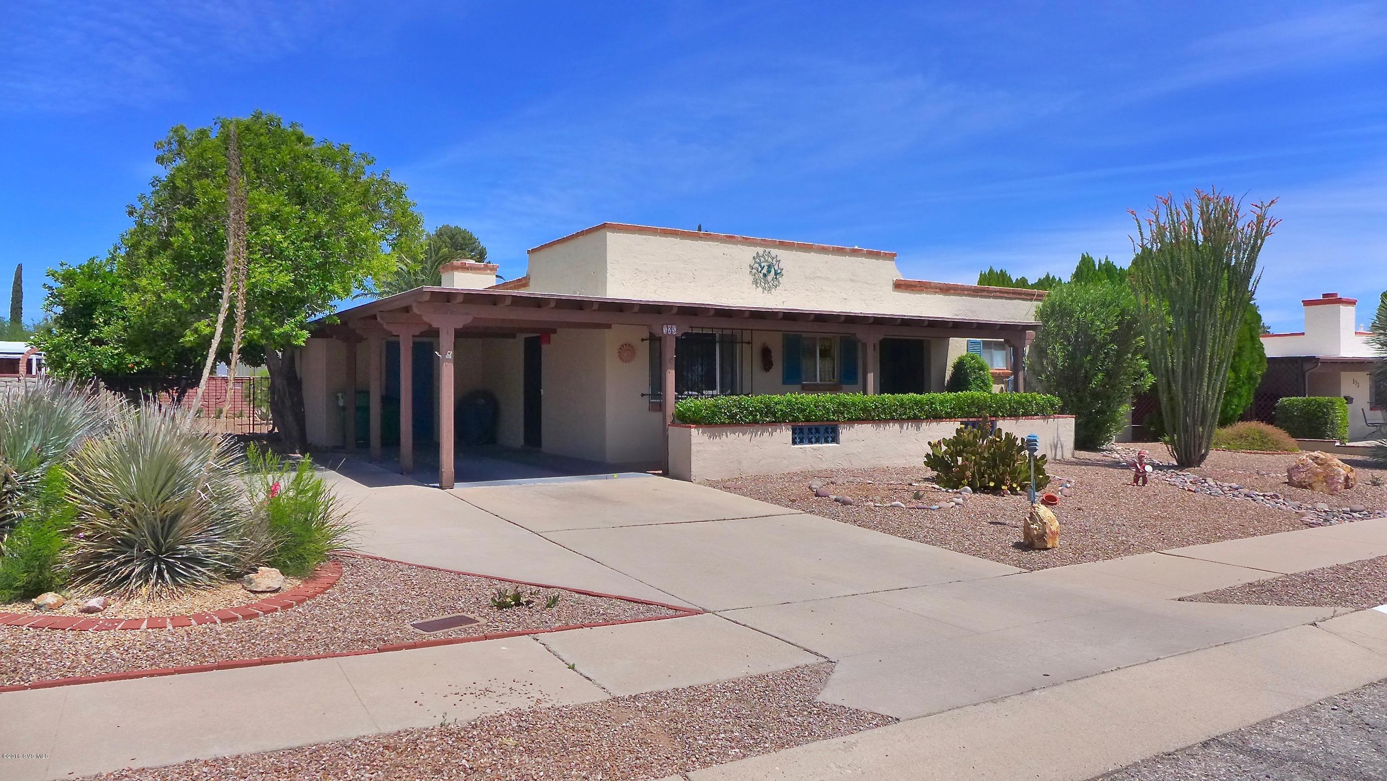 This special home makes a great first impression with its outstanding curb appeal. And the inside doesn't disappoint. Freshly painted with beautiful pops of color, it will make you feel instantly ''at home''. And, an added bonus is that is comes fully furnished as shown. You'll appreciate the open floor plan, and the spacious rooms. The centerpiece of the living room is a gas fireplace--perfect for taking the chill off a cold winter's night. Your favorite space may be the sunroom with its wall of windows overlooking the beautiful & private backyard. The big backyard backs to a common area for added privacy. Easy care landscaping means you'll have plenty of time to enjoy all the amenities that Green Valley offers.