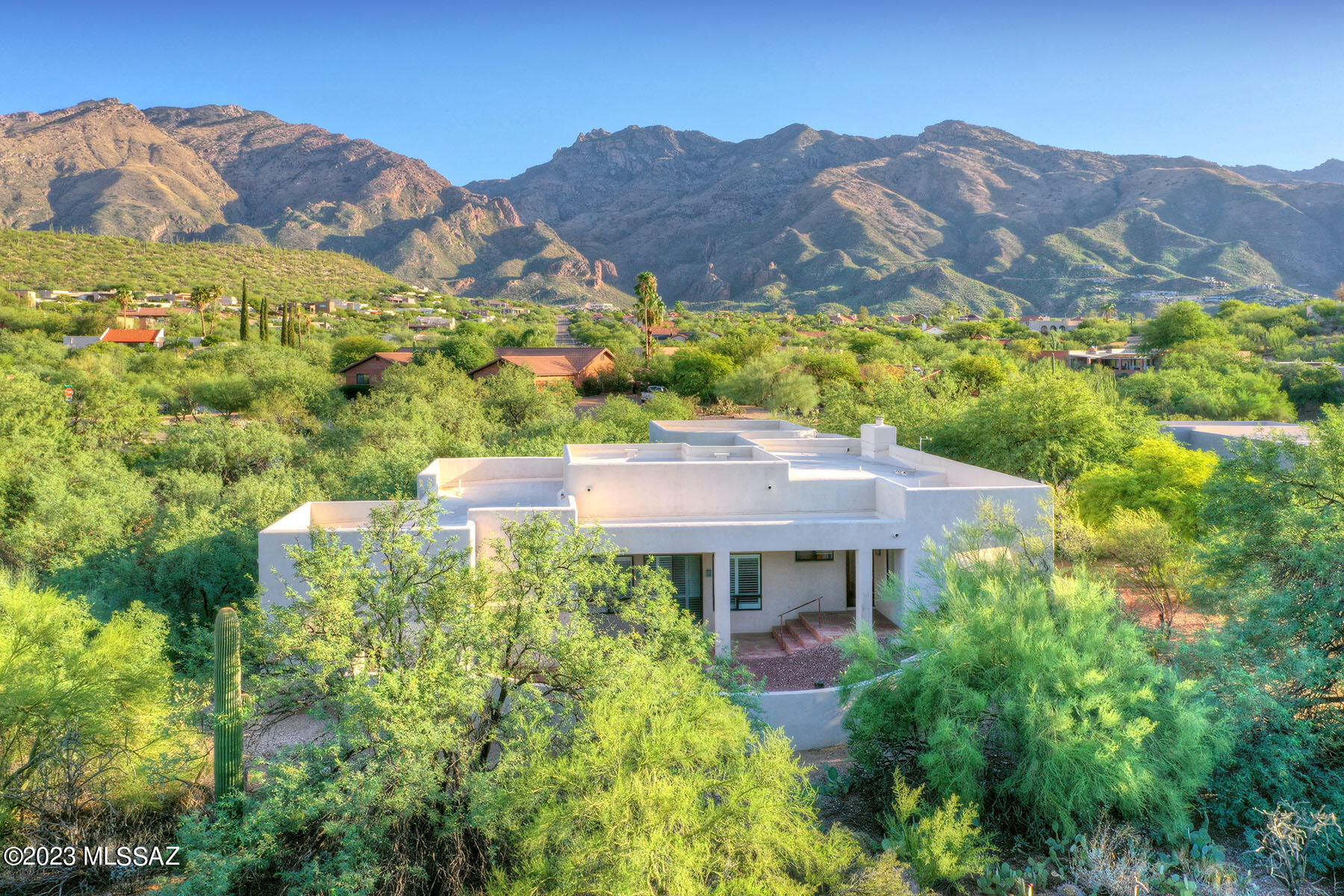 Charming Cimarron Estates Home on lush, private
lot!  One level with only two interior steps.  Winding walkway to the Double French Door entry.  Spacious great room with high ceilings and Sliding Doors to the patio.  Lovely dining area opens to the kitchen.  Kitchen features an island with breakfast bar, sink & dishwasher. Great cabinet & Corian counters plus a walk-in pantry.
Family Room has an electric fireplace.  Split bedroom plan.  Primary suite features a sitting area, walk in closet and bath with separate vanity area, tub & walk in shower.  Den/office or 4th bedroom has access to a 3/4 bath and the west side deck.  Two bedrooms near the kitchen share a full hall bath. Huge laundry room w/ cabinets &  sink.  Saltillo & engineered wood throughout.  Newer HVAC systems. SEE MORE