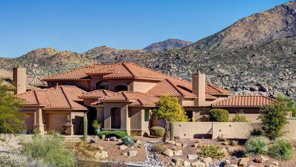 A timeless executive home surrounded by breathtaking mountain views.  This elegant home overlooks the Preserve Golf Course and embraces nature making it a truly restorative environment.  A home with an entertainer's heart in mind with a very private backyard, self-cleaning pebble tec pool, large spa w/rock water feature, built-in BBQ w/large seating area, firepit & cabana.  There is even a spacious casita.   Upscale interior amenities include 18'' tile flooring, granite counters, cherry cabinets, SS apps including ice maker, Kitchen Aid flush to wall refrigerator, Wolfe 6 burner gas stove, custom window treatments & light fixtures, updated master bath w/glass block shower, gorgeous built-in dining room china cabinet & entertainment center.