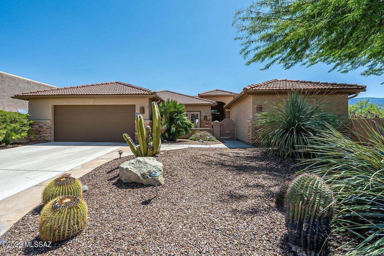 Expansive Catalina Mountain Views! Front courtyard entry welcomes you to this tastefully updated and well maintained Laredo with guest casita. Interior features include updated primary & guest bath, granite counters in kitchen, newer kitchen appliances(2018), built-in entertainment center, ceiling fans, new carpet/pads in bedrooms, new higher efficiency HVAC(2017) & more. Exterior of home/walls painted 2020, auto drip irrigation replaced 2021. The place to relax and take in the beautiful Catalina Mountain views is the back patio. Special features include extended paver patio, built-in BBQ, putting green, raised garden bed, hot tub pad...perfect setting for enjoying the SaddleBrooke lifestyle. Comfortable & Casual...A very special place to call home. You'll never want to leave!