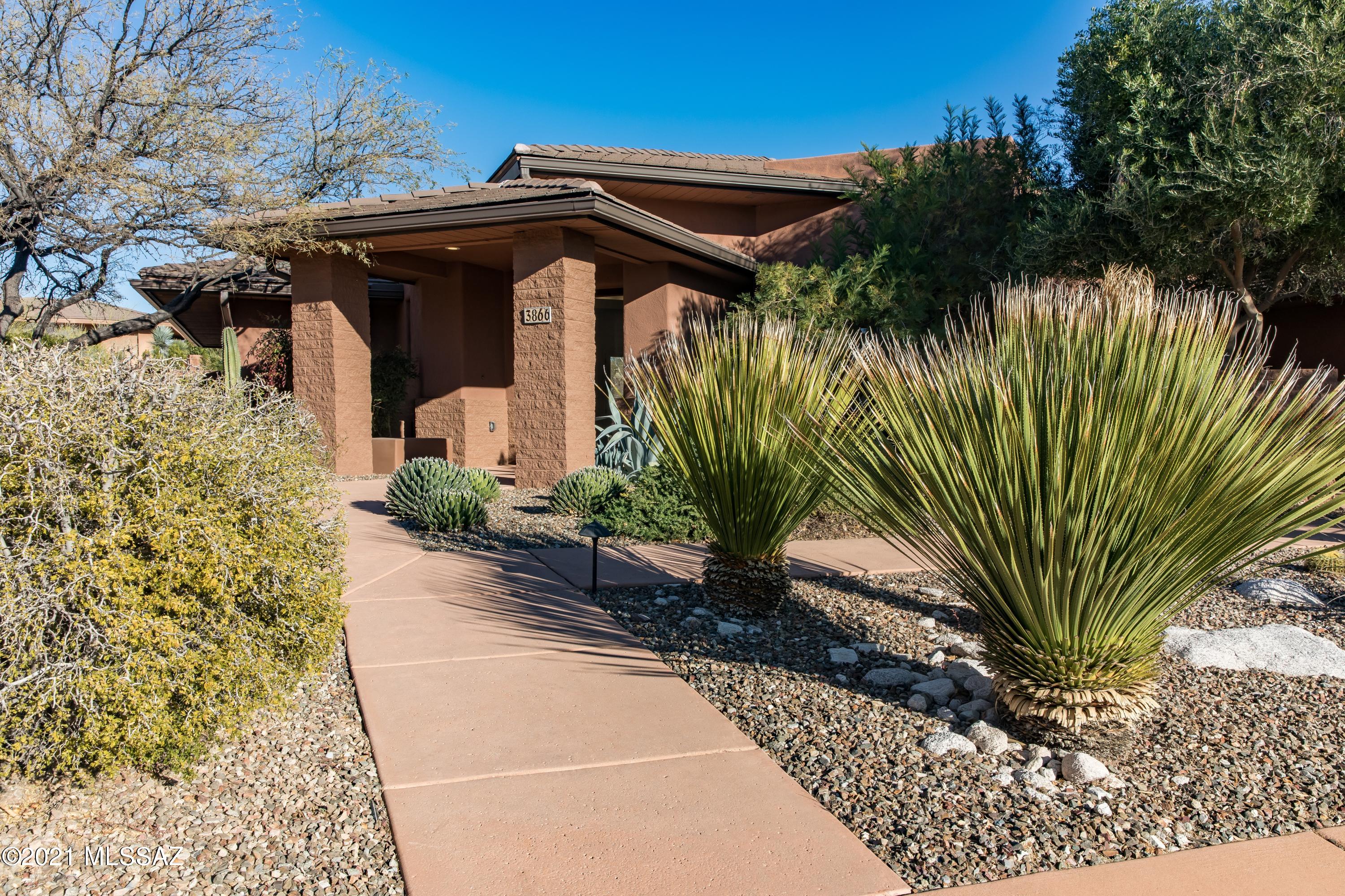 One of a kind Canyon Ranch home is open, bright, contemporary and ready for you! Peaceful and quiet setting with spectacular desert landscaping.  Two bedroom 2.5 bathroom, split plan plan.  Very modern and like new.  Home just completed in 2018 and offers new Viking appliances and new finishings. Health, wellbeing and an active lifestyle is what awaits you at the world renowned Canyon Ranch. The ultimate in privacy and security, as well.  Be inspired to live your best and healthiest life with the expert advice and guidance of the Canyon Ranch team...whatever you want to work on, Canyon Ranch has the space and knowledge for you to expand, grow, and move forward in 2023 and beyond. Call Kay for more information on this home and any others at the Ranch.