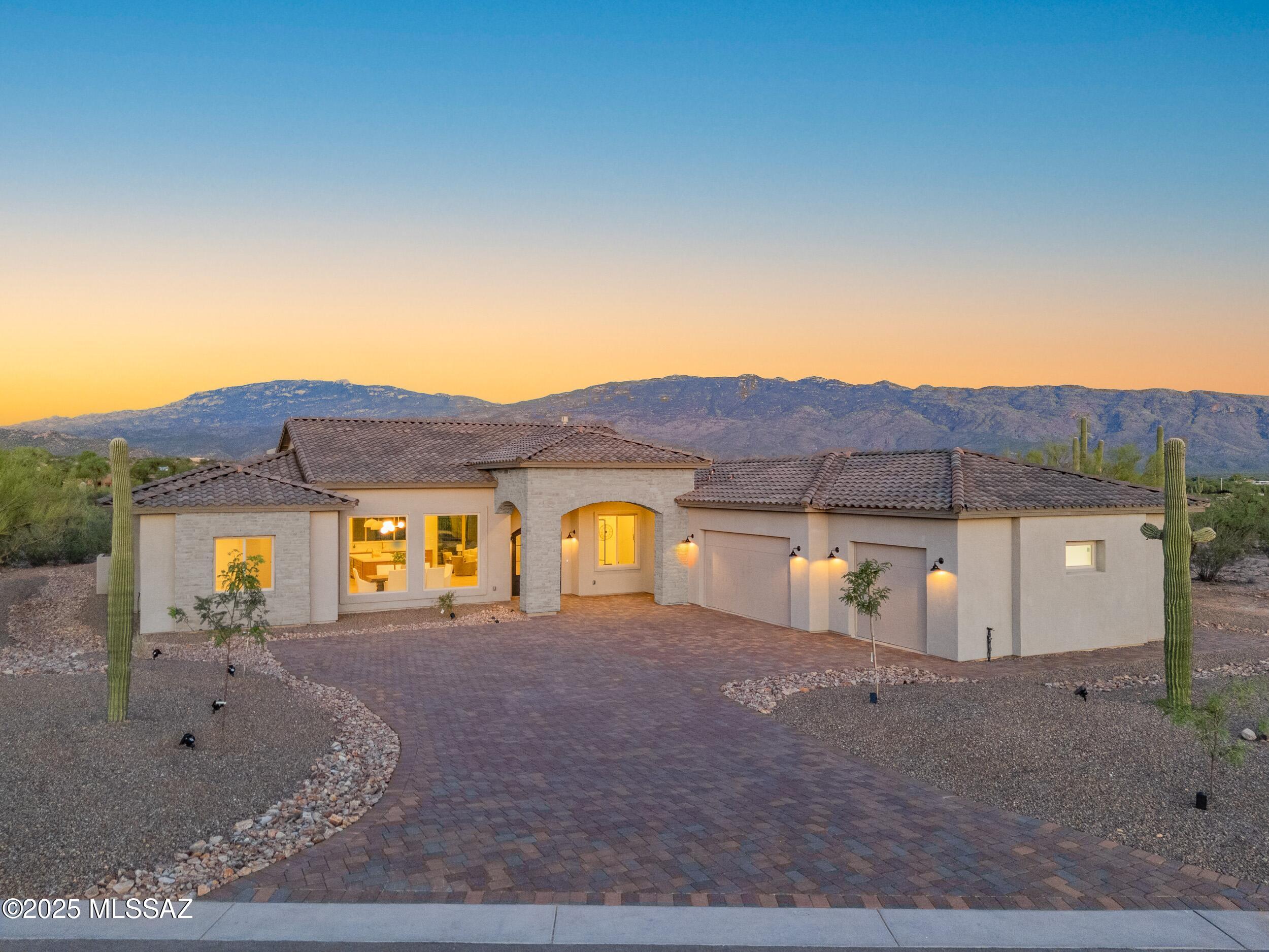 Beautiful Rincon Mountain and Reddington Views! this open concept floor plan, incorporated with outdoor living, boasts 4 BR with an amazing kitchen and Butler's Pantry, Private Office, Great Room, Formal Dining, and laundry/mudroom is a great place to call home! Large 1.213 acre plot in a beautifully landscaped and gated community.  Come and see this brand new home in the newly opened Rancho Soldados Phase II community.