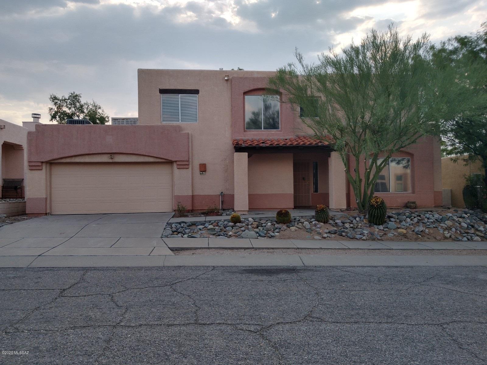 This enormous east side 4 bedroom is just what you've been looking for.  This home has a large bonus room on the first floor to use as an office, media room, or guest bedroom.  There is a formal living room, dining room.  The backyard is low care with a wash running behind it.  There is a large covered patio great for entertaining.  Freshly painted, new carpet throughout and newer appliances!  For quick and easy cleaning there is a central vacuum.  Upstairs is dedicated for living quarters, with big bedrooms and bathrooms.  Newer A/C (installed in 2018).  This home has it.  Come see this beautiful home Today!! This enormous east side 4 bedroom is just what you've been looking for.  This home has a large bonus room on the first floor to use as an office, media room, or guest bedroom.  There is a formal living room, dining room.  The backyard is low care with a wash running behind it.  There is a large covered patio great for entertaining.  Freshly painted, new carpet throughout and newer appliances!  For quick and easy cleaning there is a central vacuum.  Upstairs is dedicated for living quarters, with big bedrooms and bathrooms.  Newer A/C (installed in 2018).  This home has it.  Come see this beautiful home Today!!