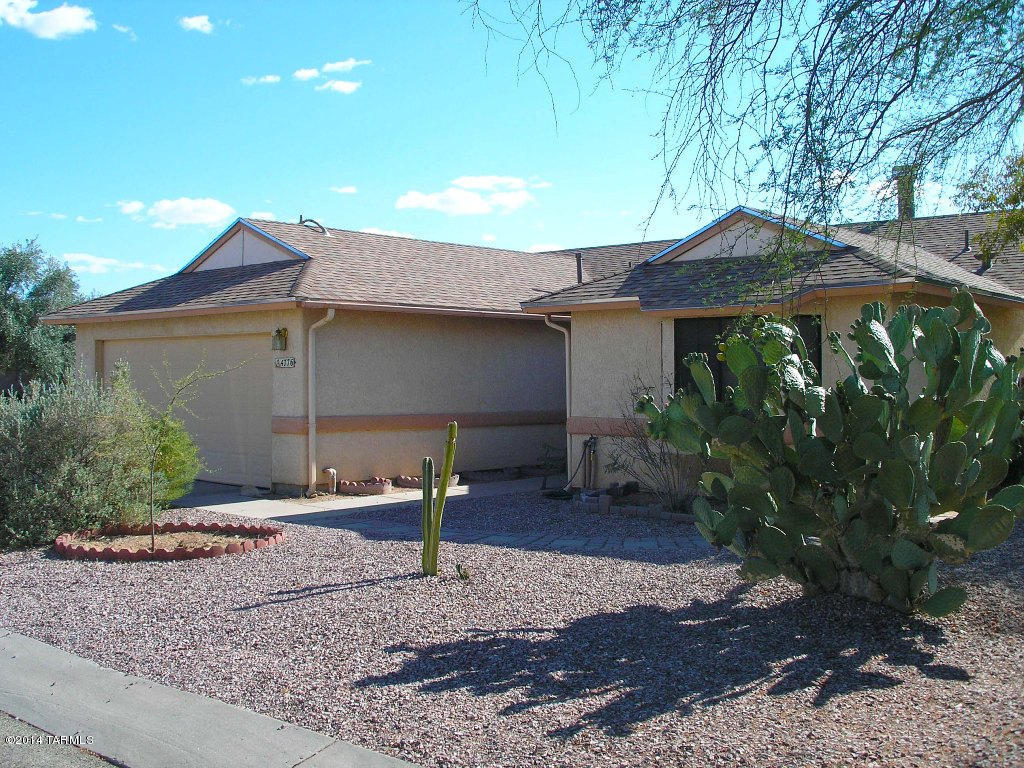 Wonderful 3 bedroom 2 bath home for rent in Marana school district. Large Corner lot. This home features a split bedroom plan, family room with fireplace. Kitchen has refrigerator, dishwasher, over range microwave & gas stove. Dining area off kitchen with bay window. Spacious Master bedroom. Master bath has dual vanities and soak tub/shower combo. Laundry room off 2 car garage with electric Washer/Dryer Hooks Up only. One guest bedroom is quite large. Covered patio with extended paver block area & a fire-pit. Double gate access to yard. 12 month minimum lease term. Pets require owner approval and additional deposit/fee. Proof of Renter's Insurance is required at lease signing.