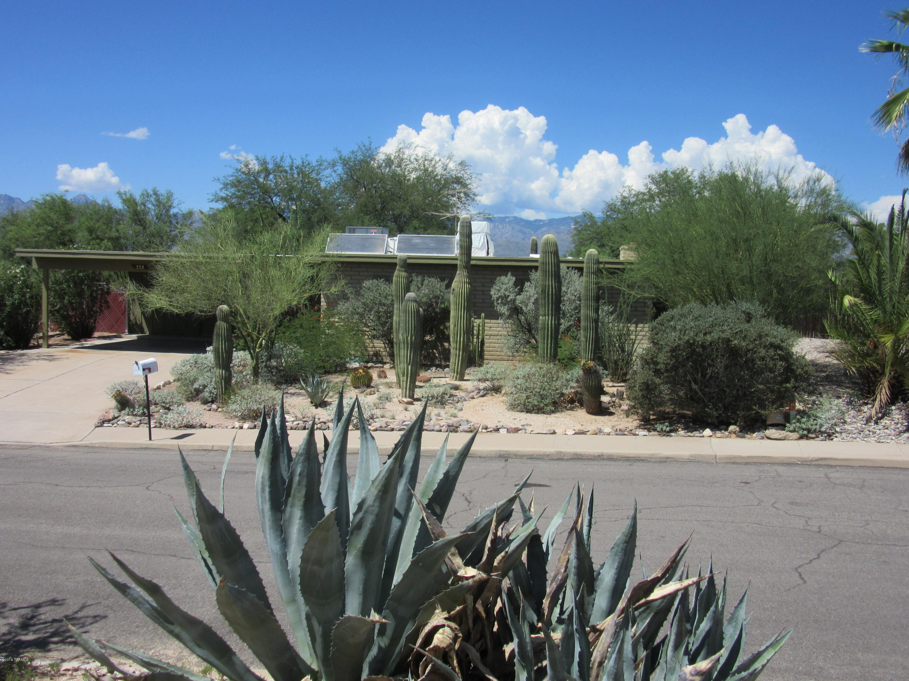 Fantastic-dramatic mountain vistas. Whole backyard is north facing, ALL SHADED. Birds, BIG trees, 17 saguaros, all mature landscaping, extra large lot on large cul-de-sac, BIG-hill common area in front of the home. Very private.....the home has been extremely well taken care of, turn key, ready to move in. New bathrooms, new carpet, new paint, new granite kitchen, AC, popcorn has been removed, all new appliances in kitchen, copper/galvanized plumbing, slump block construction, all new windows and sliding door, all windows in the back of the home have 180 degree mtn. Beautiful inside-out views. Most of lot is irrigated. Has small area for grass if you wish. Nice patio area, lots of room for a pool. Get it now, the best home in Tucson. See agent remarks! Allow several days for response.