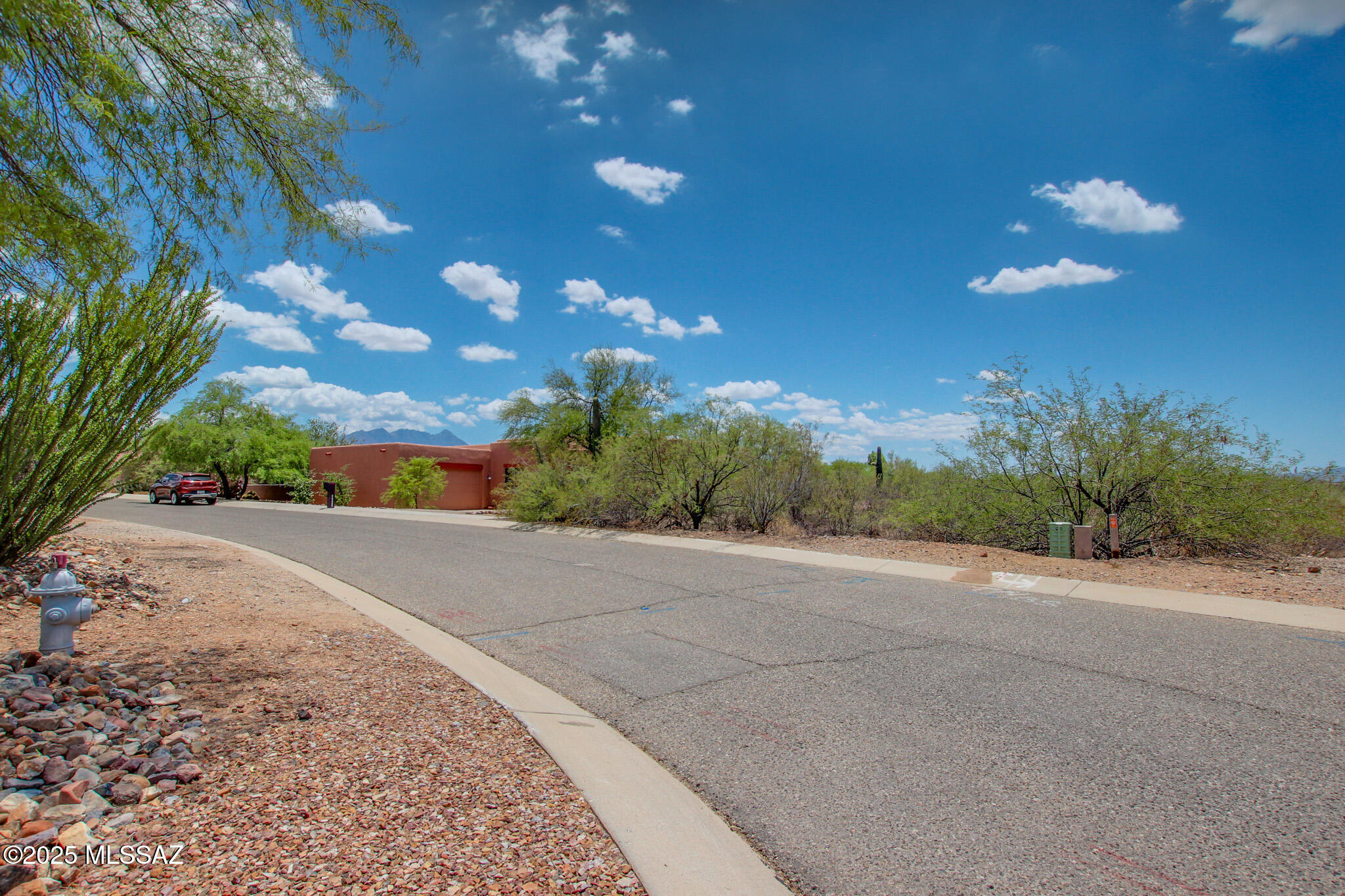 Located on a spacious 0.39-acre lot in one of Green Valley's most sought-after communities, this prime piece of land offers breathtaking views of the Santa Rita Mountains. Perfectly positioned to take advantage of the serene surroundings, this is an ideal spot to build your dream home. Enjoy the beauty of nature while being part of a welcoming, desirable neighborhood. Don't miss this opportunity to create the home you've always envisioned in a location that offers both tranquility and convenience.