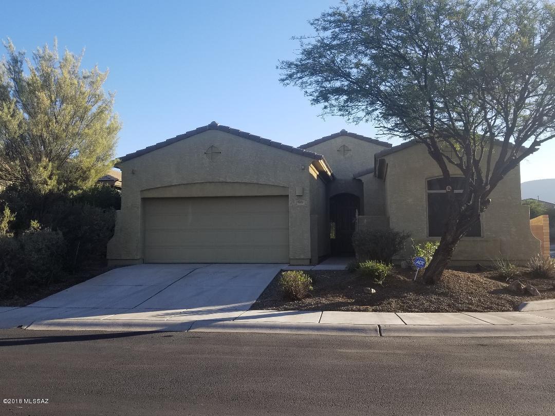 **CHECK THIS OUT** BIG PRICE REDUCTION** Real nice 4BR/2.5 BA contemporary home with an open spacious floor plan and vaulted ceilings!  Polished concrete floors and carpeting, full large kitchen with abundant cabinets and granite countertops!  Resort like back yard with a pool, spa and covered patio!  DON'T MISS OUT ON THIS PROPERTY!!