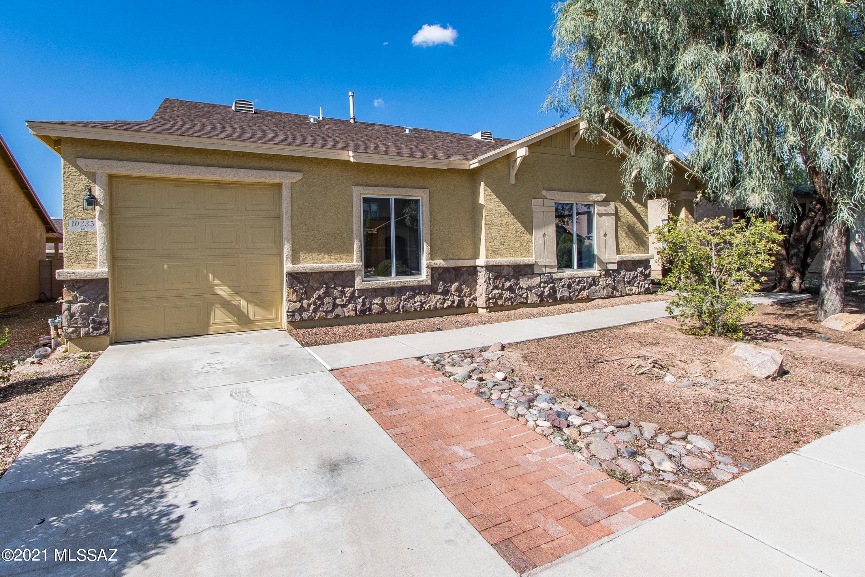 Perfectly remodeled 4 bedroom home is ready for its new owners! Located in close proximity to Davis Monthan, I-10 and near schools, shopping and all the many amenities of Southeast Tucson, this newly redone beauty has it all! Great room with cozy fireplace and on trend solid surface floors is the perfect compliment to the bright, sunny kitchen of your dreams complete with stainless steel appliances and breakfast nook/dining area. Upgraded fixtures throughout! Master en suite features double vanity and shower/tub plus a generous walk in closet. 3 additional bedrooms and a full bath all with contemporary fixtures, fresh paint and new flooring. Backyard with covered patio has limitless possibilities. Conveniently close to everything you need!