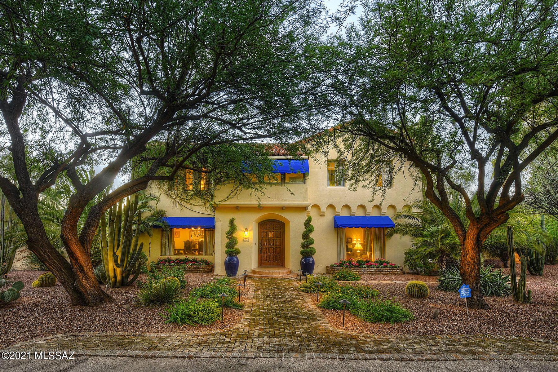 Finalist in HGTV's ULTIMATE  HOUSE HUNT 2022,  this grand jewel in the heart of historic El Encanto Estates is impeccably updated with superior craftsmanship & filled with elegant entertaining spaces & cozy family gathering areas, every corner is stunning! Extensive paved patios, fountains & mature landscaping make for a private sanctuary just moments from the city center, Tucson's finest dining, medical, & shopping! 6 bedrooms (they have created a charming playroom/homework area in one & a workout room in another), plus a fabulous home office, grand master suite & spacious guest rooms. The kitchen is a stand-out, window-lined, beautifully remodeled w/ all modern amenities, breakfast bar, walk-in pantry & butler's pantry. Grand living rm, family rm, formal & informal dining - it's a WOW!!