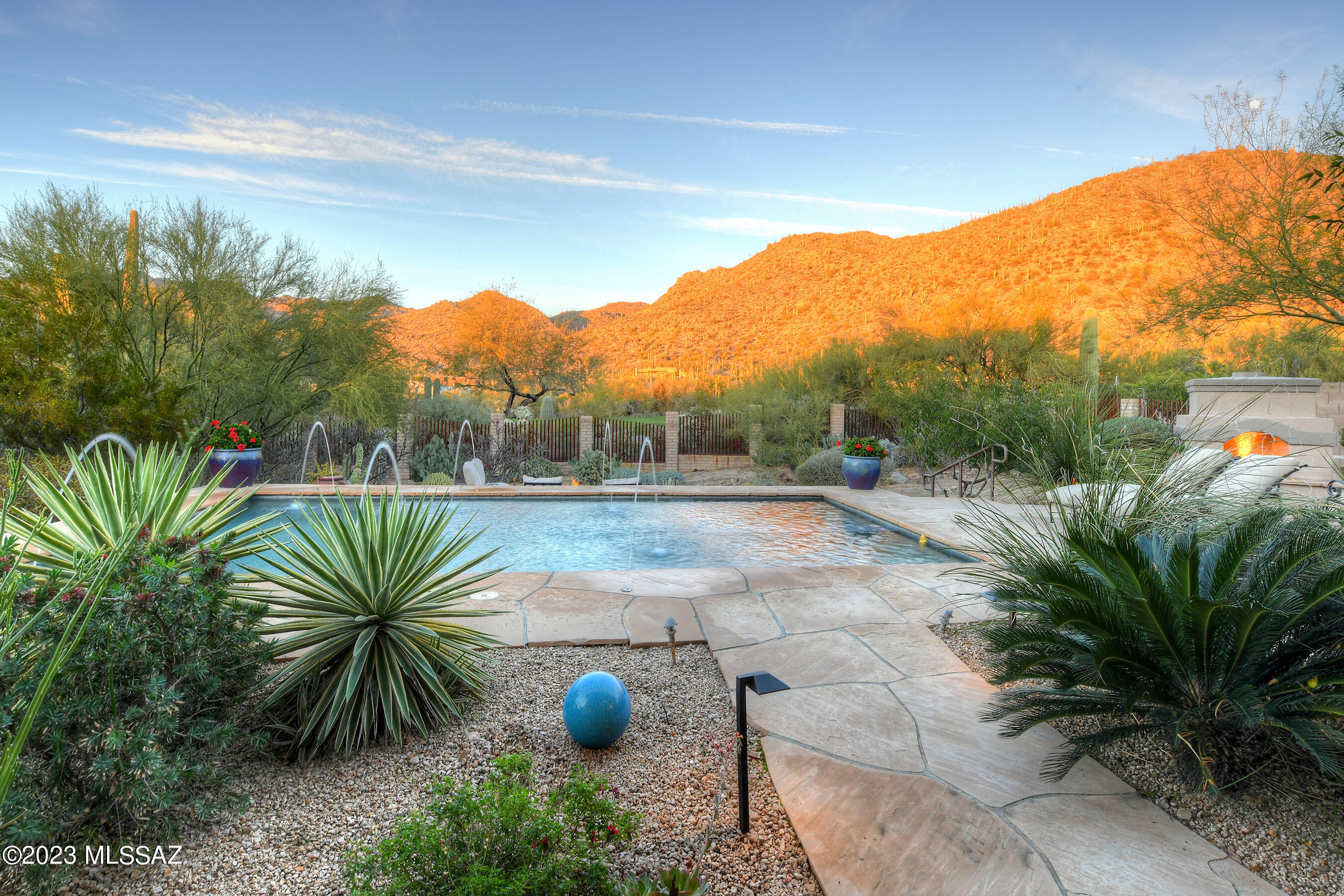 * DESERT DELIGHT* FABULOUS TOLL BROS ESTATE ON 1/2 ACRE IN FTHLS OF TORTOLITA MTNS! BORDERING ''THE GALLERY''  NORTH COURSE OFFERS ABUNDANCE OF NATURAL DESERT TERRIAN, LUSH FAIRWAYS & INCREDIBLE MTN VIEWS! RESORT STYLE BKYD- HEATED POOL/SPA,  2 COZY CHAT AREAS- F/P + FIREPIT, MATURE LANDSP, BUILT IN BBQ, TURF AREA,-SPACE FOR PLAYAREA & FULLY COV'D VERANADA PERFECT FOR OUTDOOR LIVING! MODERN DESIGN *FRESHLY PAINTED & STAGED*  SHOWS LIKE MODEL! SOARING CEILINGS, GLASS WALLS/DOORS, OPEN CONCEPT- HUGE GATHERING RM W/DINING - FULL WET BAR! CHEFS KITCHEN- OVERSIZED WORK ISLAND, UPGRADED SS APPLIC, QUALITY CABS, GRANITE CTRS & MORNING CAFE W/VIEWS OF CHARMING CTYD! OFFICE/DEN+ BONUS/FLEX RM OFFERS LOTS OF LIVING SPACES! GUEST WING- ALL EN-SUITES! WALK/RIDE TO GALLERY GOLF/FITNESS