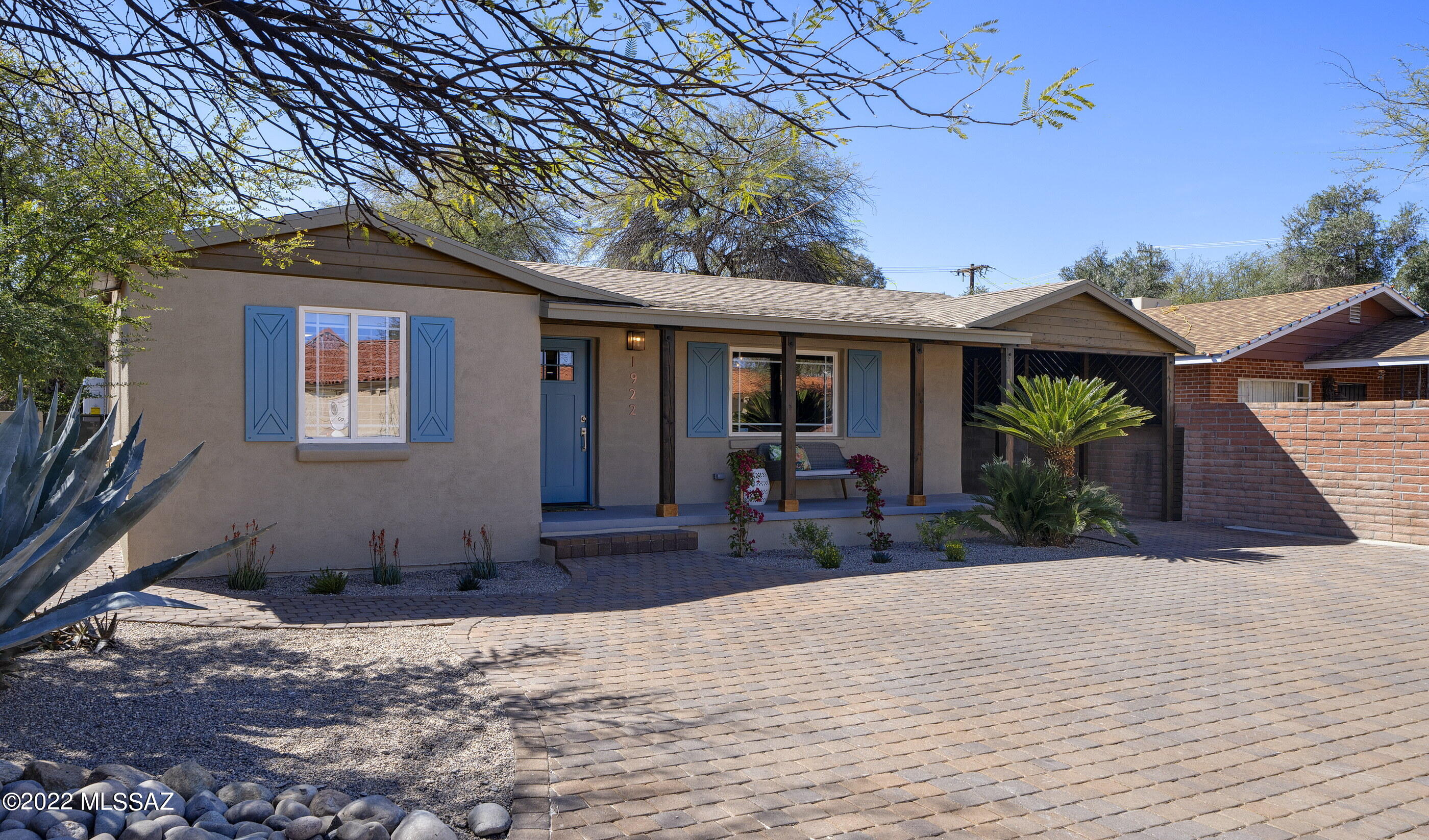 This stunning remodel by Lidda Design LLC is exquisitely designed with care and expert craftsmanship with the use of quality materials. This 3BR/3BA open plan Main House & 1 BR/1 BA Guest  House are fully remodeled w/ charm and character reflecting the era that the home was built. New gourmet kitchen, baths, flooring, electrical, plumbing & water heaters. New roof on main house. Refurbished car port and overhangs/porches feature beautiful T&G wood ceilings and recessed lighting. The back yard is an entertaining oasis with mature vegetation and fruit trees, all highlighted by a stunning ramada with fire pit and outdoor kitchen.  Guest house has a potential separate parking space, perfect for rental income, Airbnb.  Close to the Historic Arizona Inn, Banner and UA, restaurants, schools